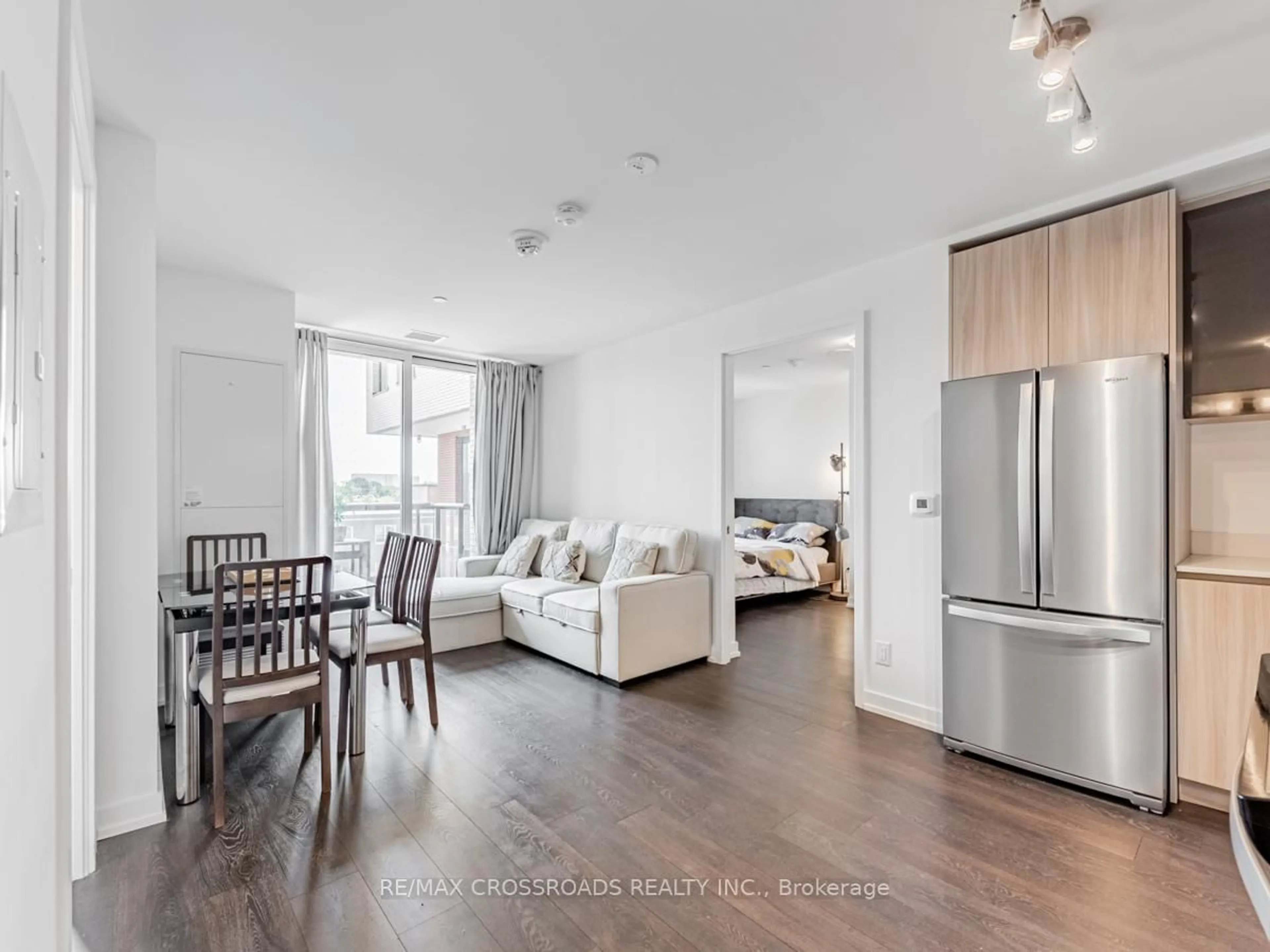 Living room with furniture, wood/laminate floor for 3100 Keele St #427, Toronto Ontario M3M 2H4