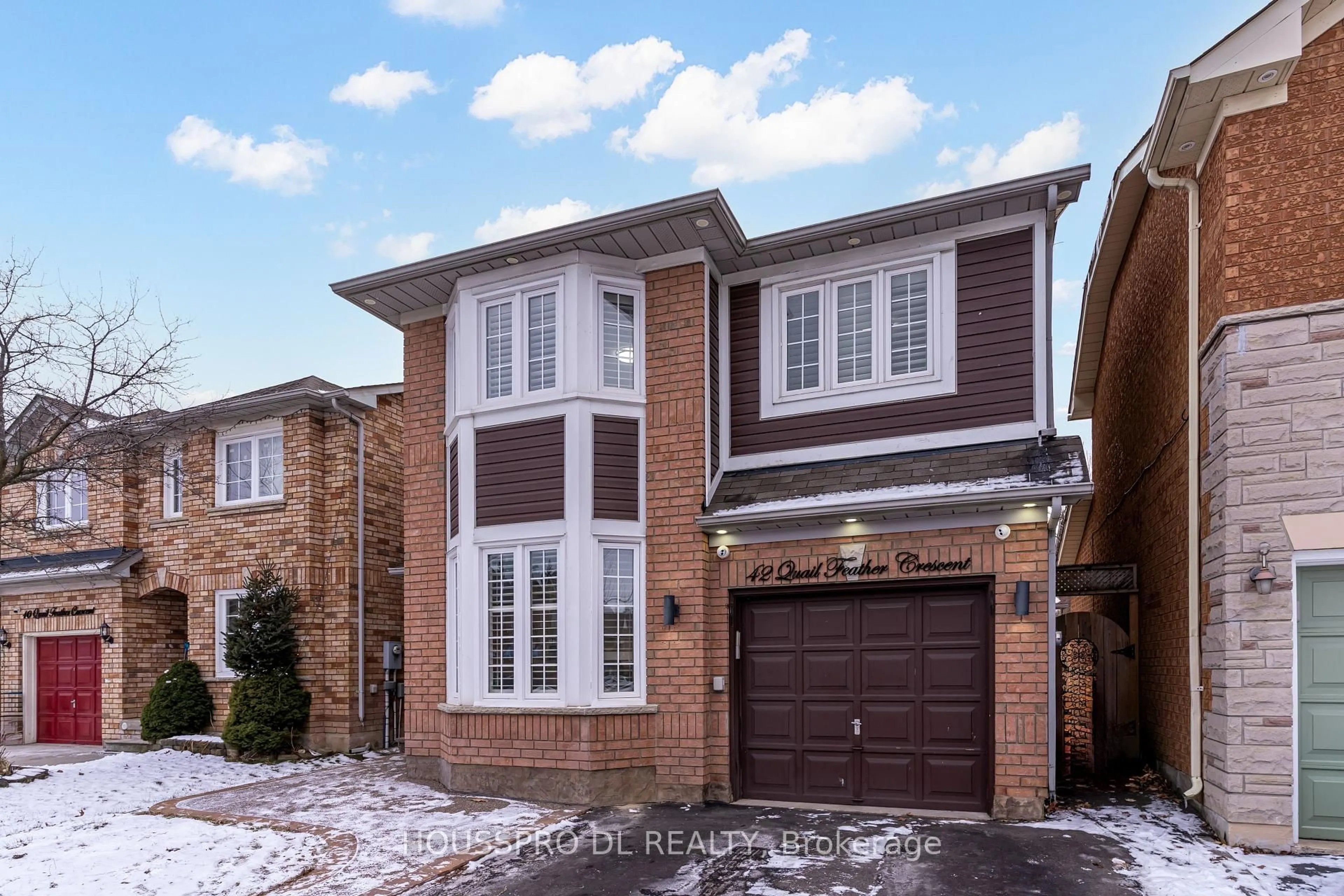 Home with brick exterior material, street for 42 Quail Feather Cres, Brampton Ontario L6R 1S7