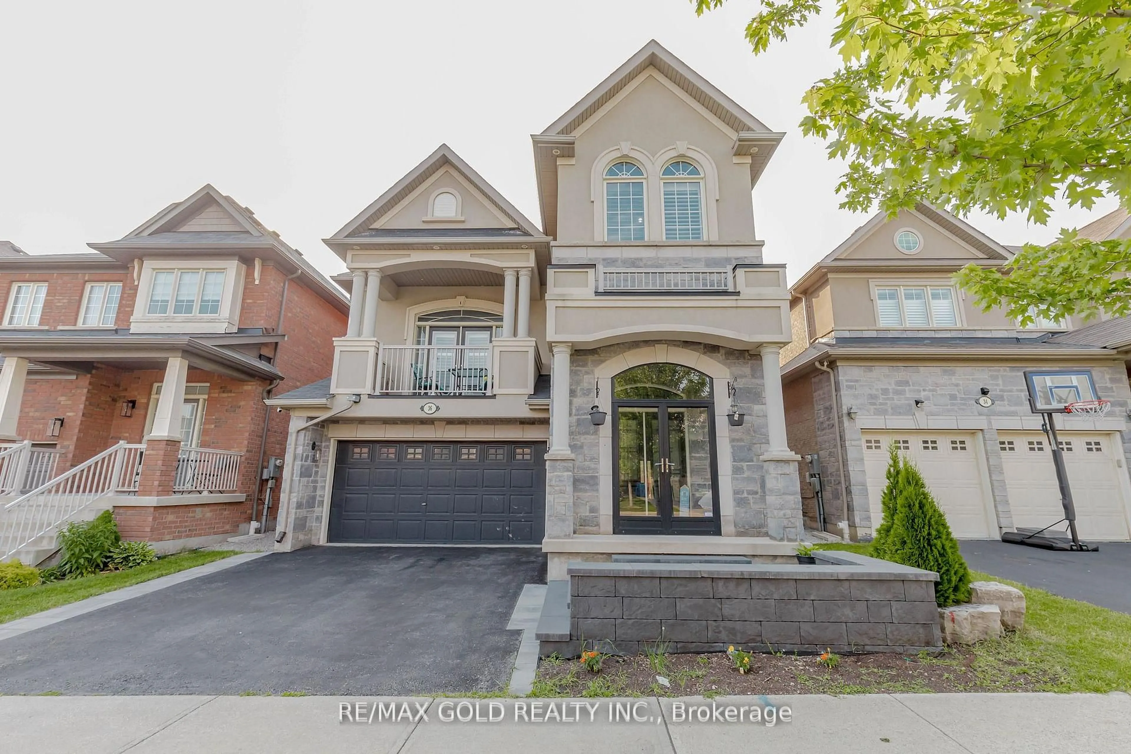 Home with brick exterior material, street for 36 Attraction Dr, Brampton Ontario L6Y 2Z8