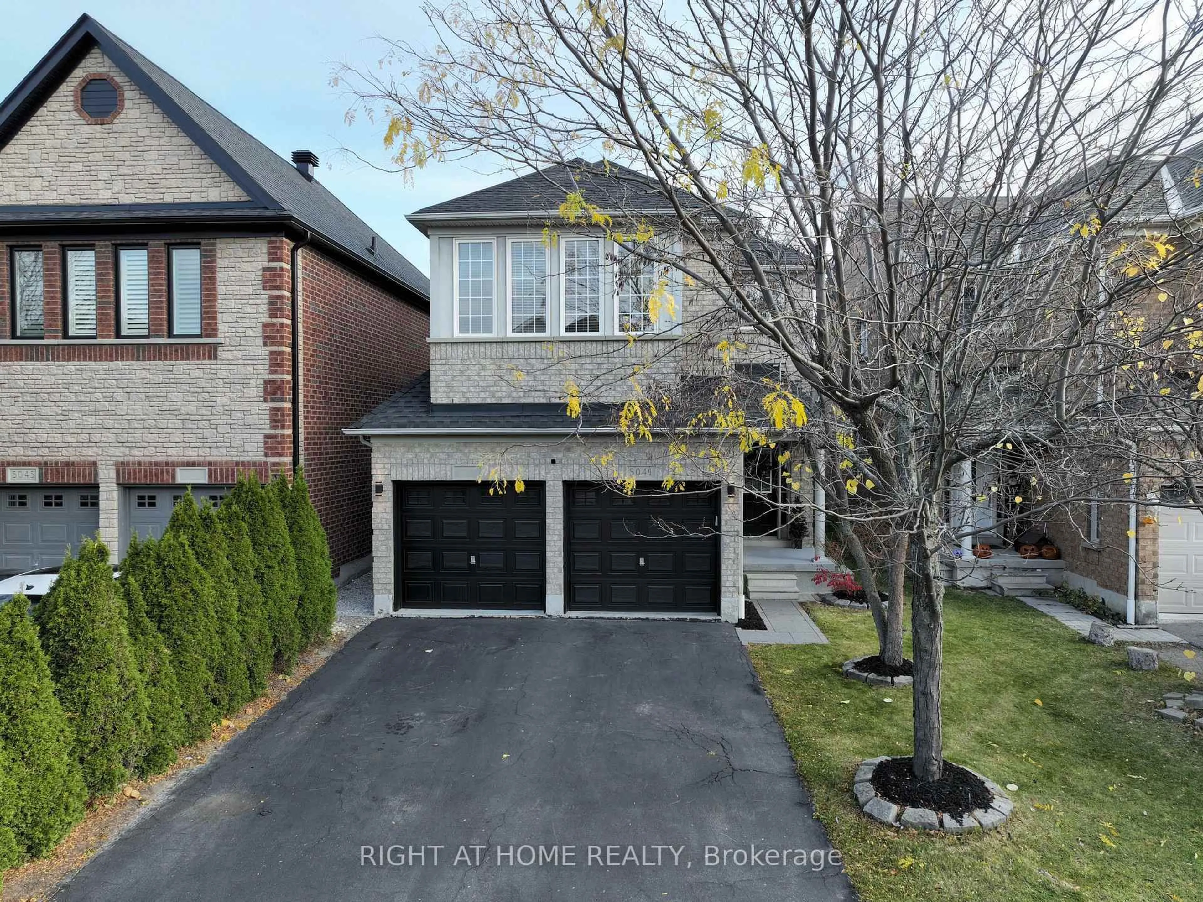 Home with brick exterior material, street for 5041 Dubonet Dr, Mississauga Ontario L5M 7X3