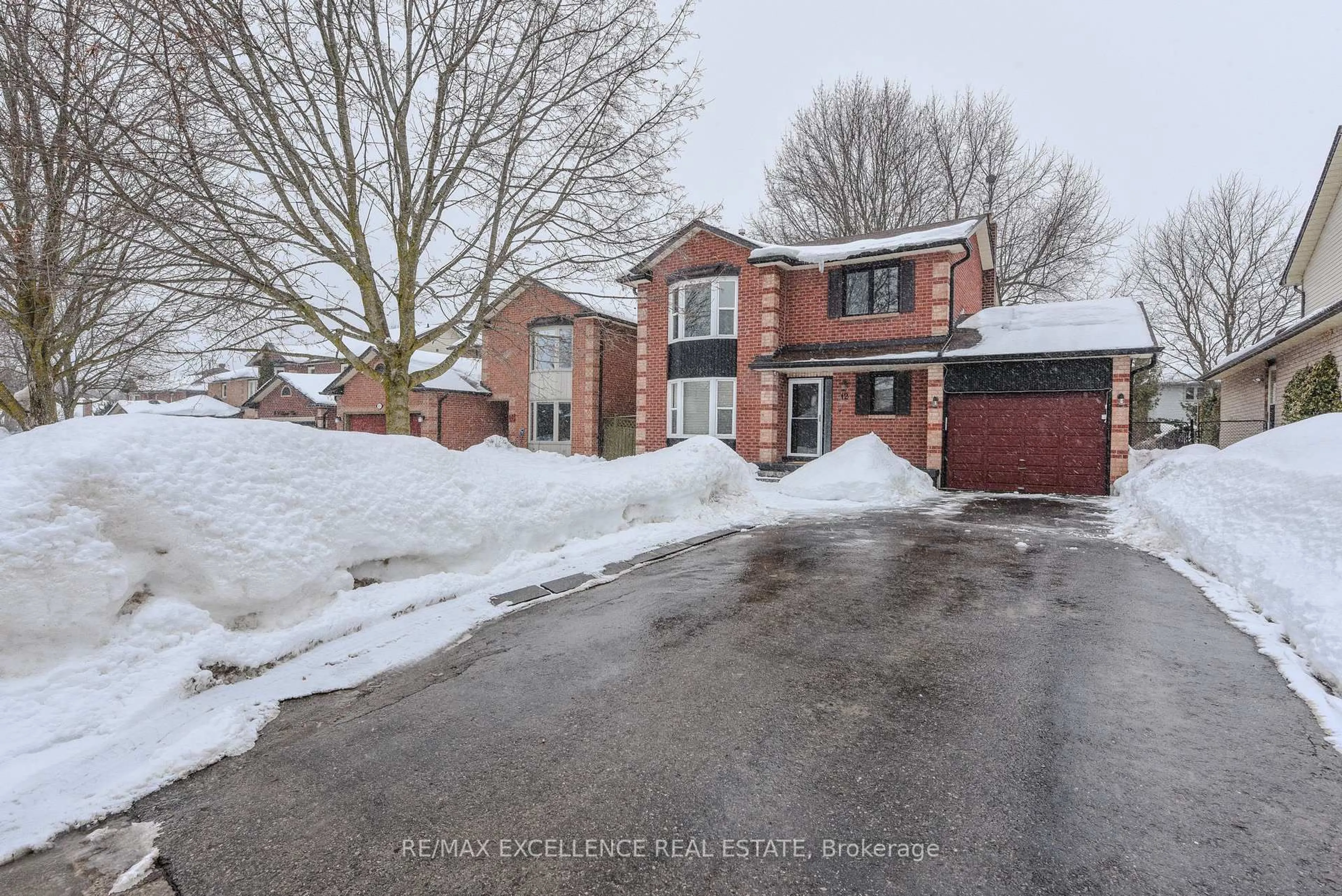 Home with brick exterior material, street for 12 Fieldgate Dr, Orangeville Ontario L9W 4K8