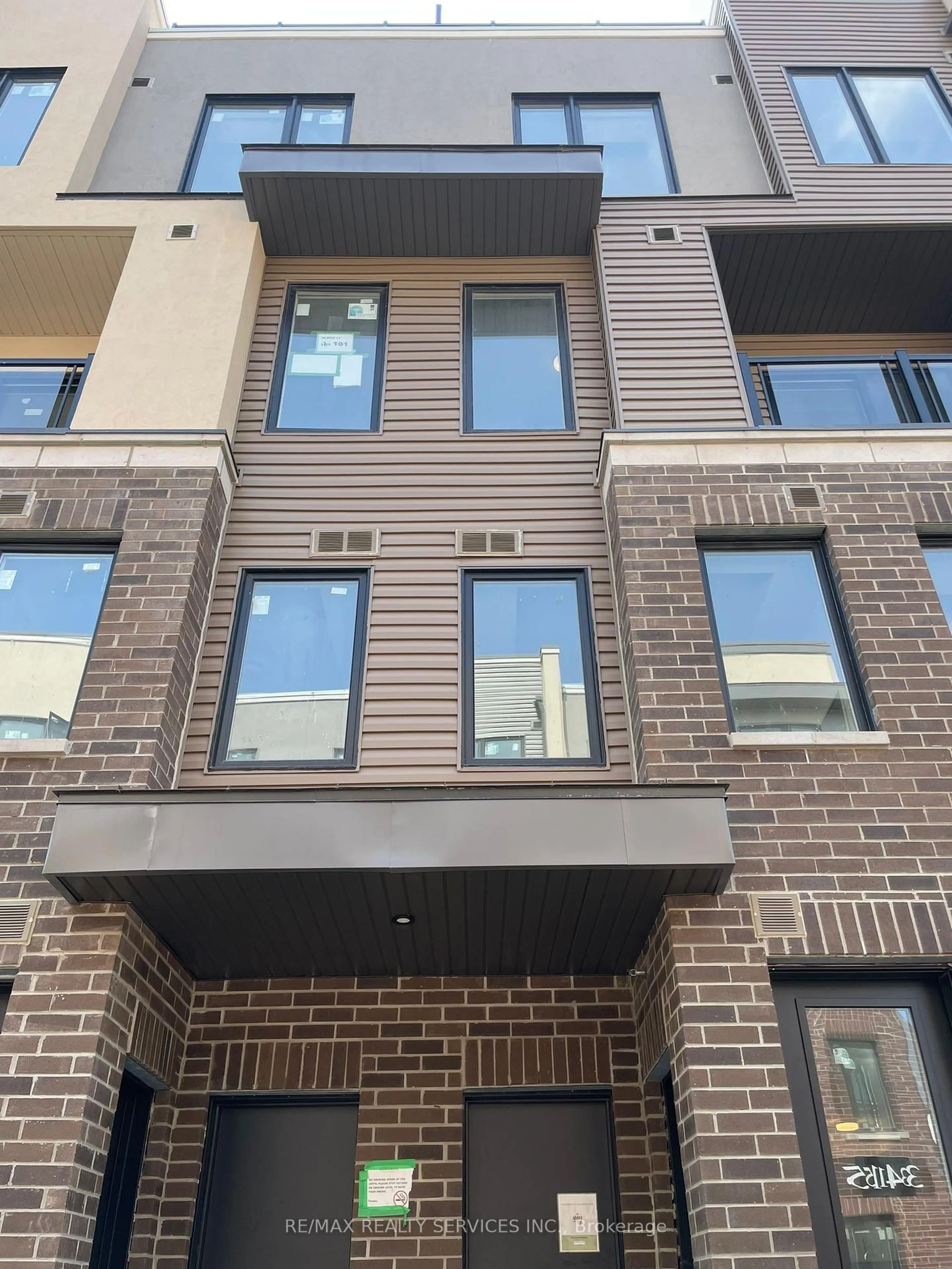 Home with brick exterior material, street for 3409 Ridgeway Dr #24, Mississauga Ontario L5L 0B9