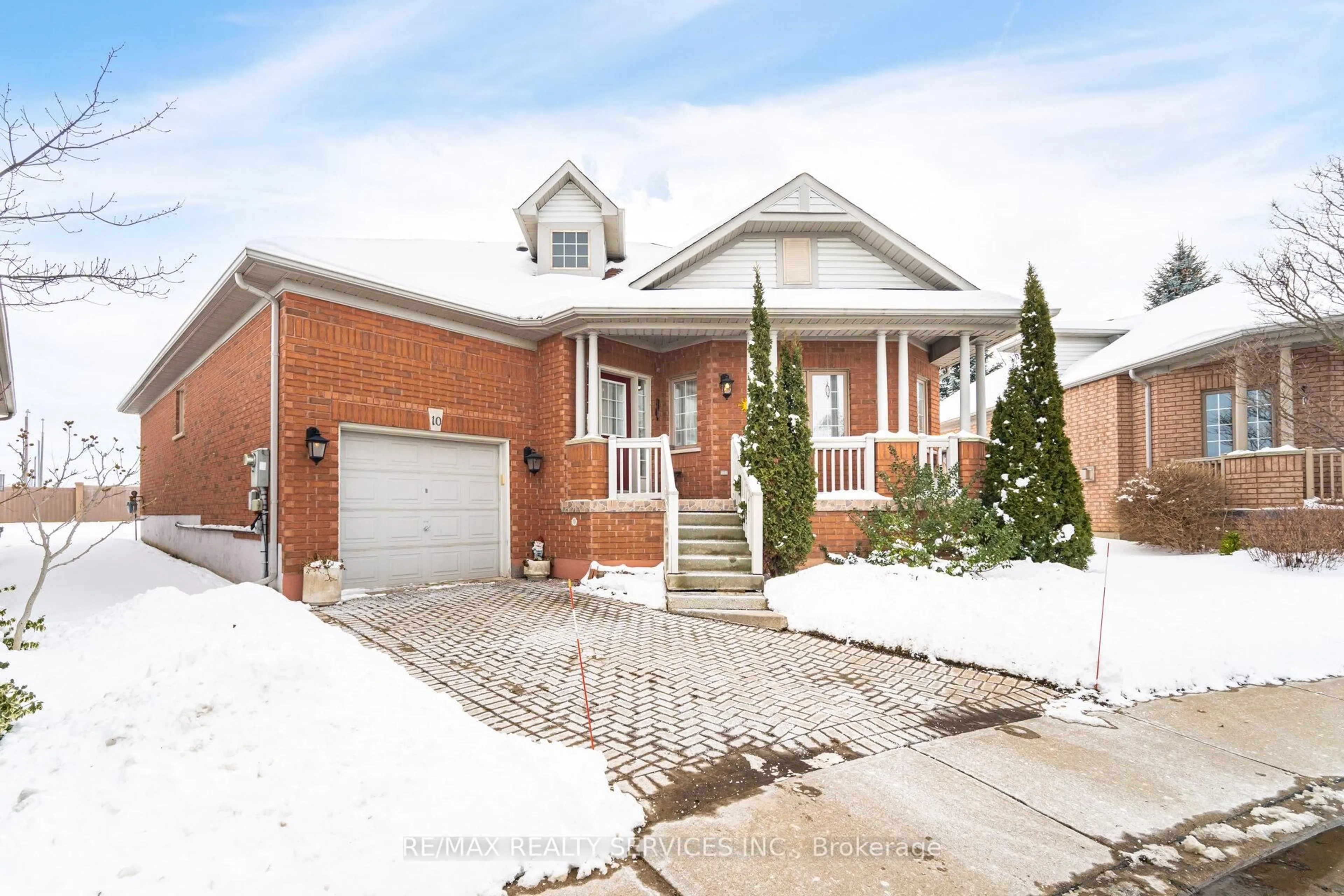 Home with brick exterior material, street for 10 Orchard Park Gate, Brampton Ontario L6R 1W5