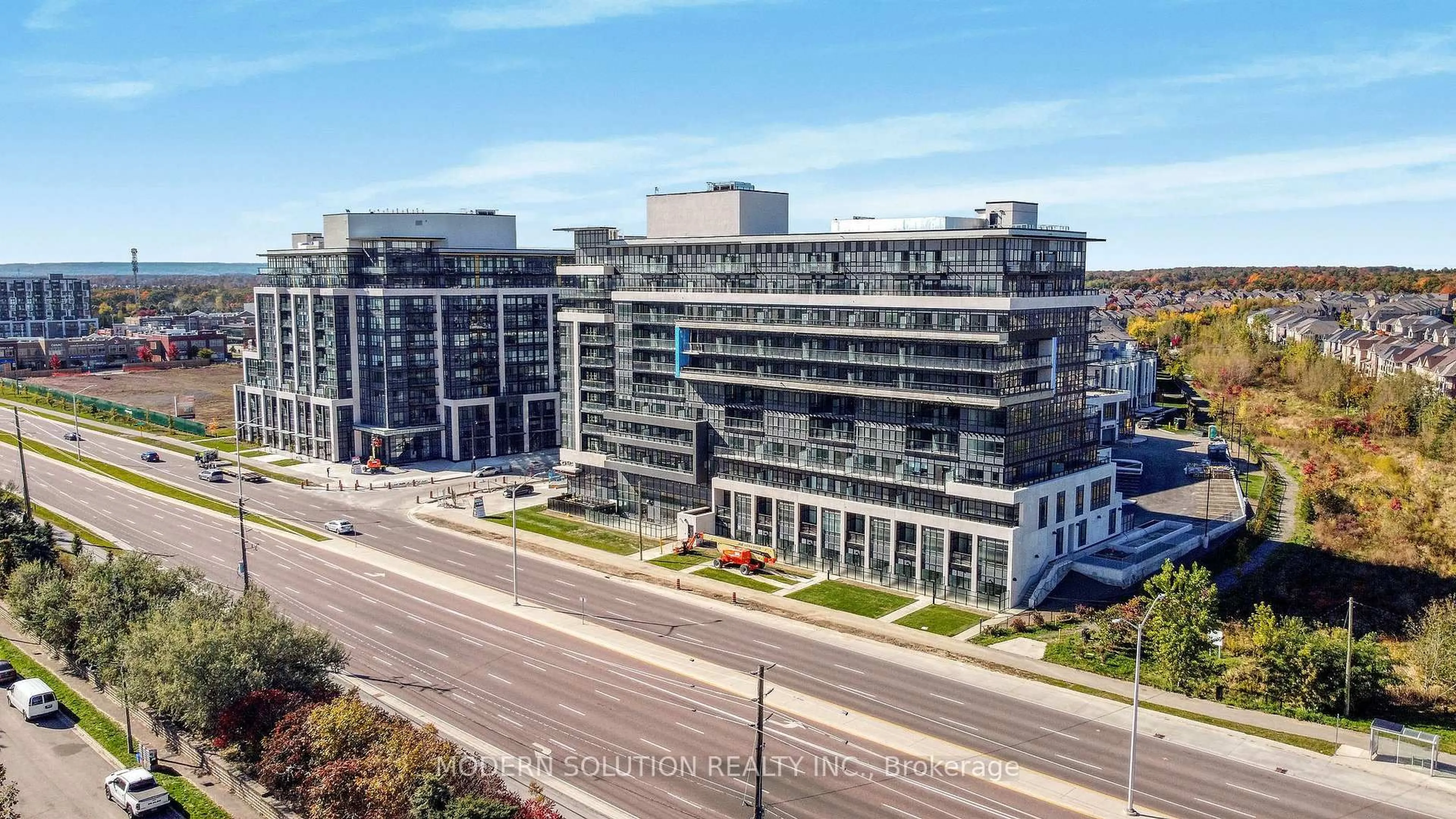 A pic from outside/outdoor area/front of a property/back of a property/a pic from drone, city buildings view from balcony for 395 Dundas St #501, Oakville Ontario L6M 4M2