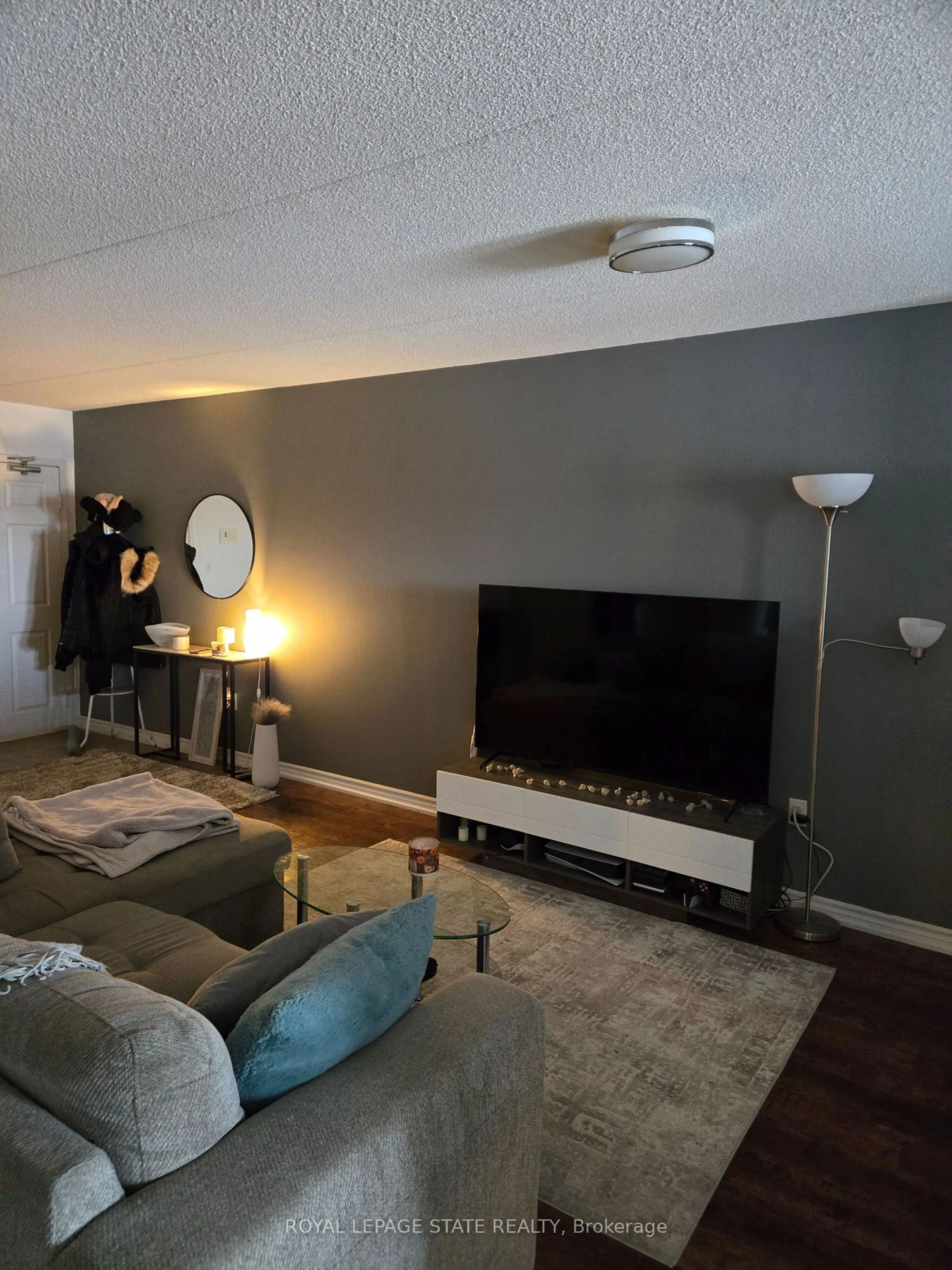 Living room with furniture, unknown for 1390 Main St #305, Milton Ontario L9T 7S9