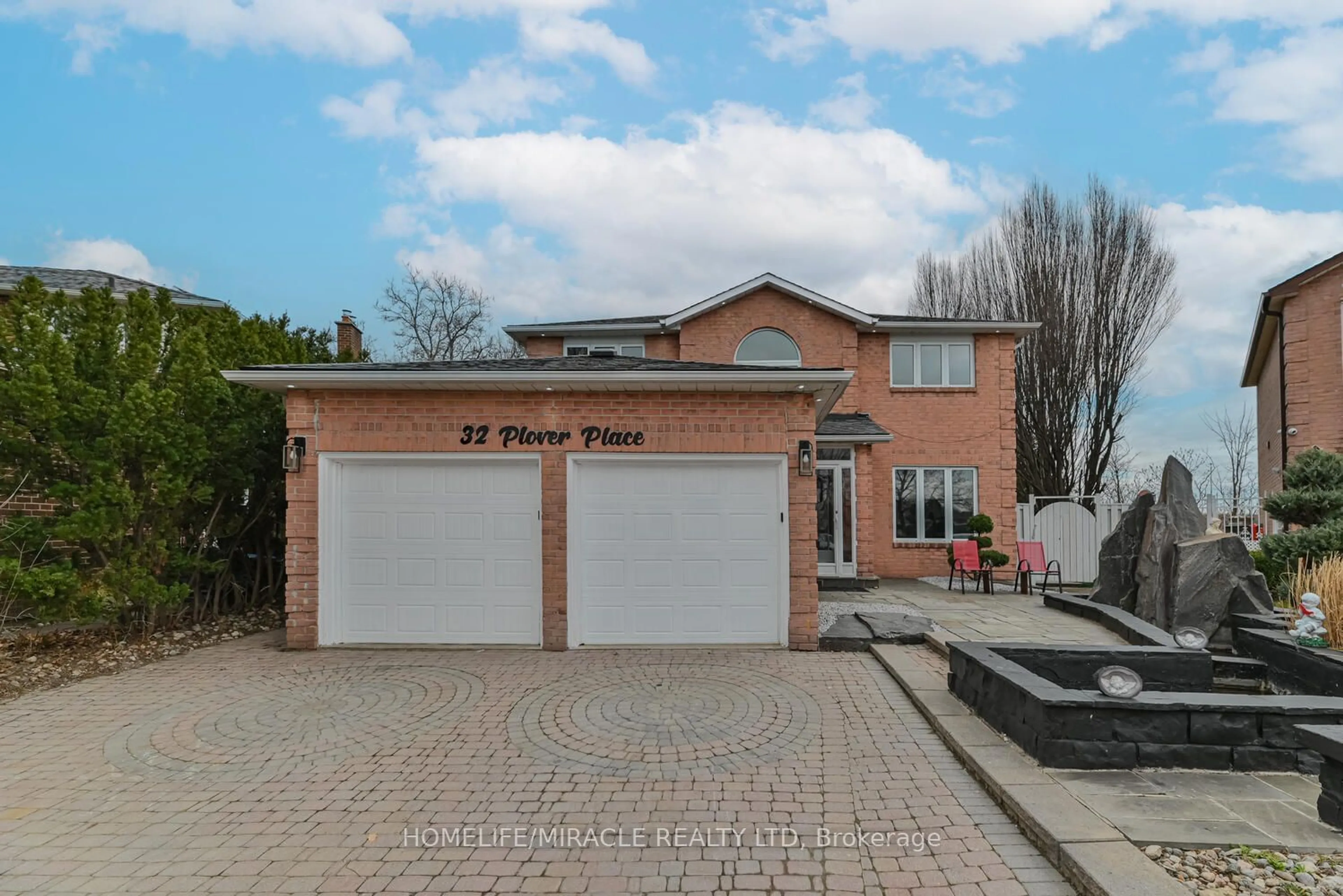 Home with brick exterior material, street for 32 Plover Pl, Brampton Ontario L6W 4C4