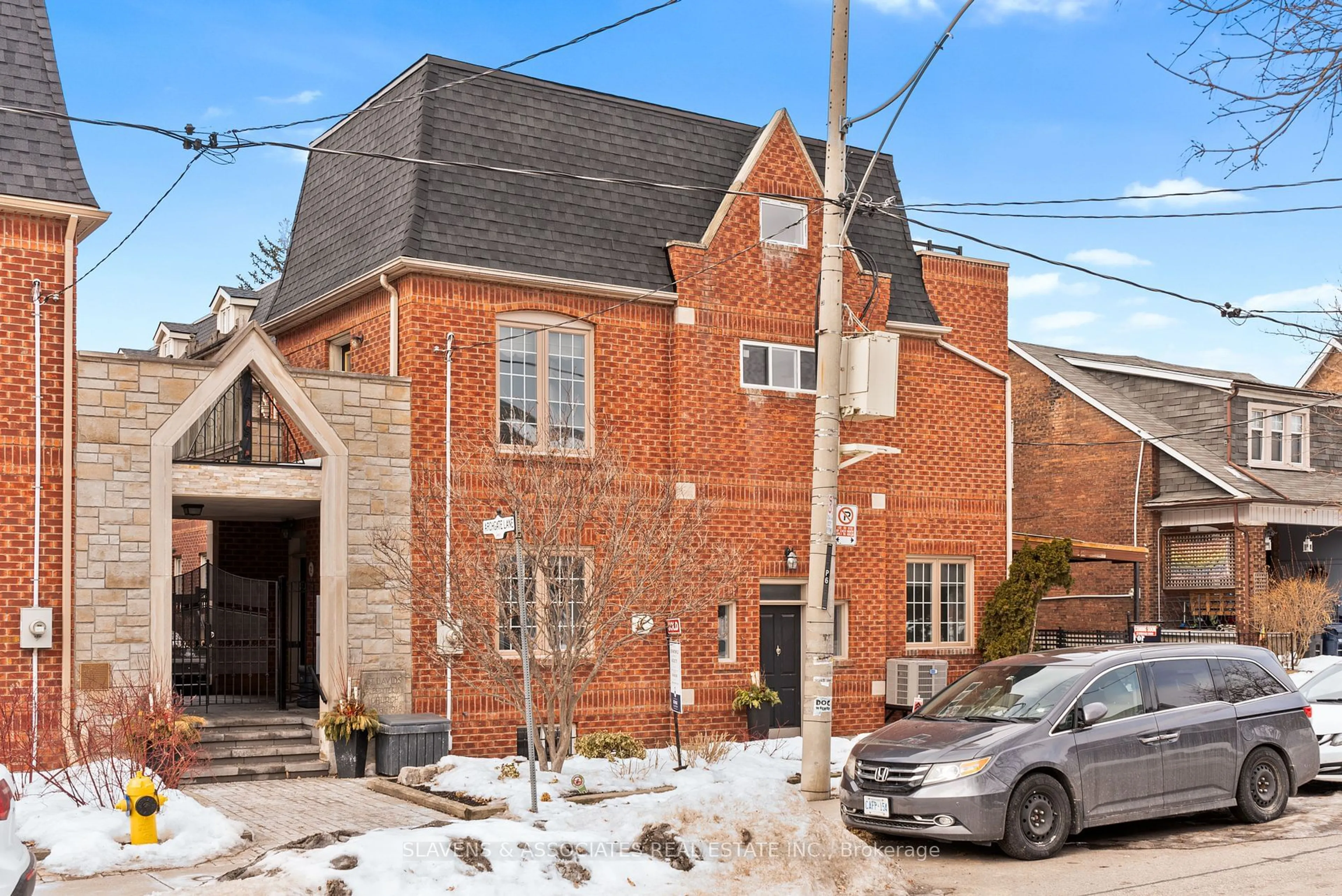 Home with brick exterior material, street for 2 Archgate Lane, Toronto Ontario M6E 5B1