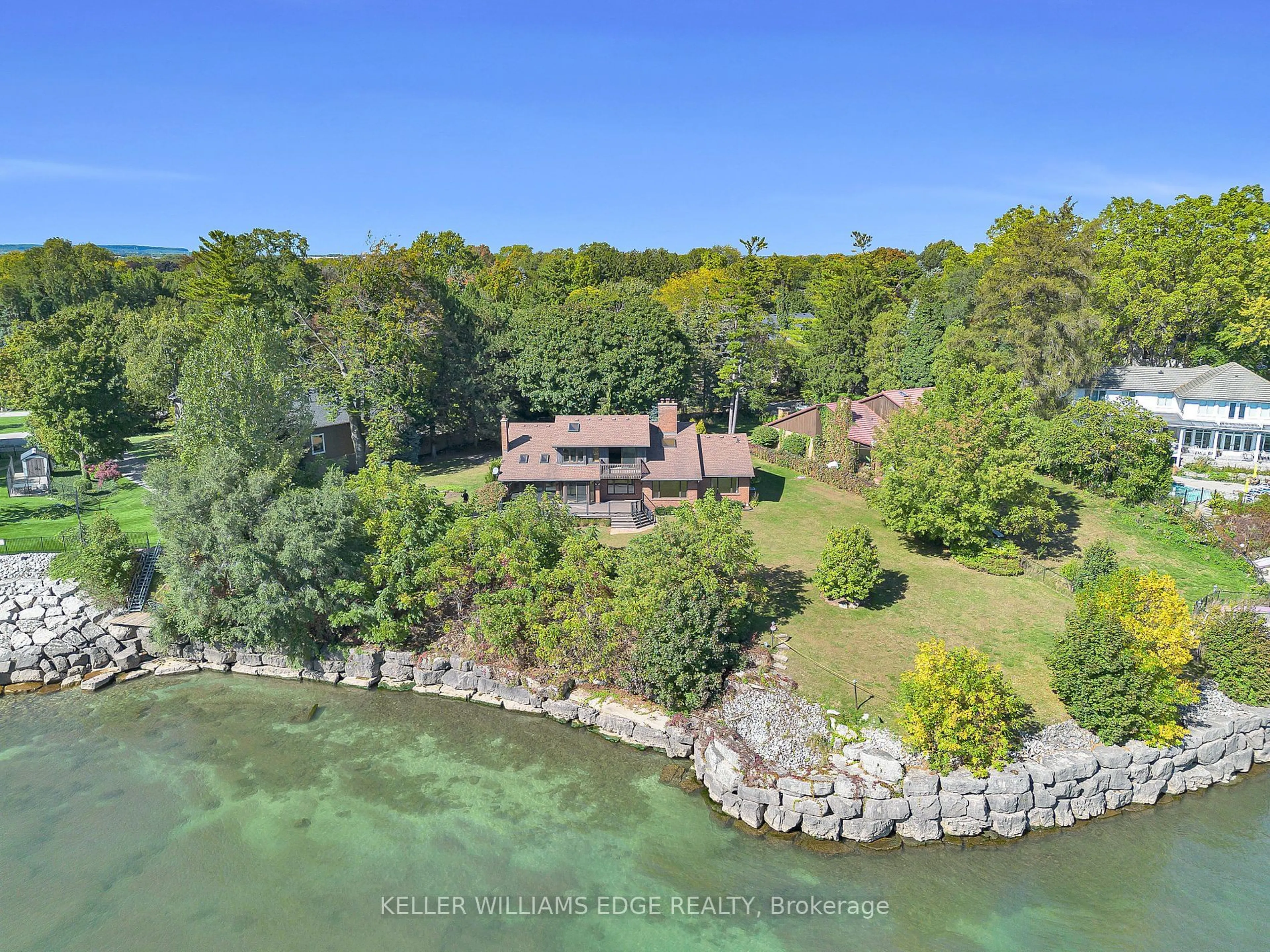 A pic from outside/outdoor area/front of a property/back of a property/a pic from drone, water/lake/river/ocean view for 3504 Lakeshore Rd, Burlington Ontario L7N 1B7