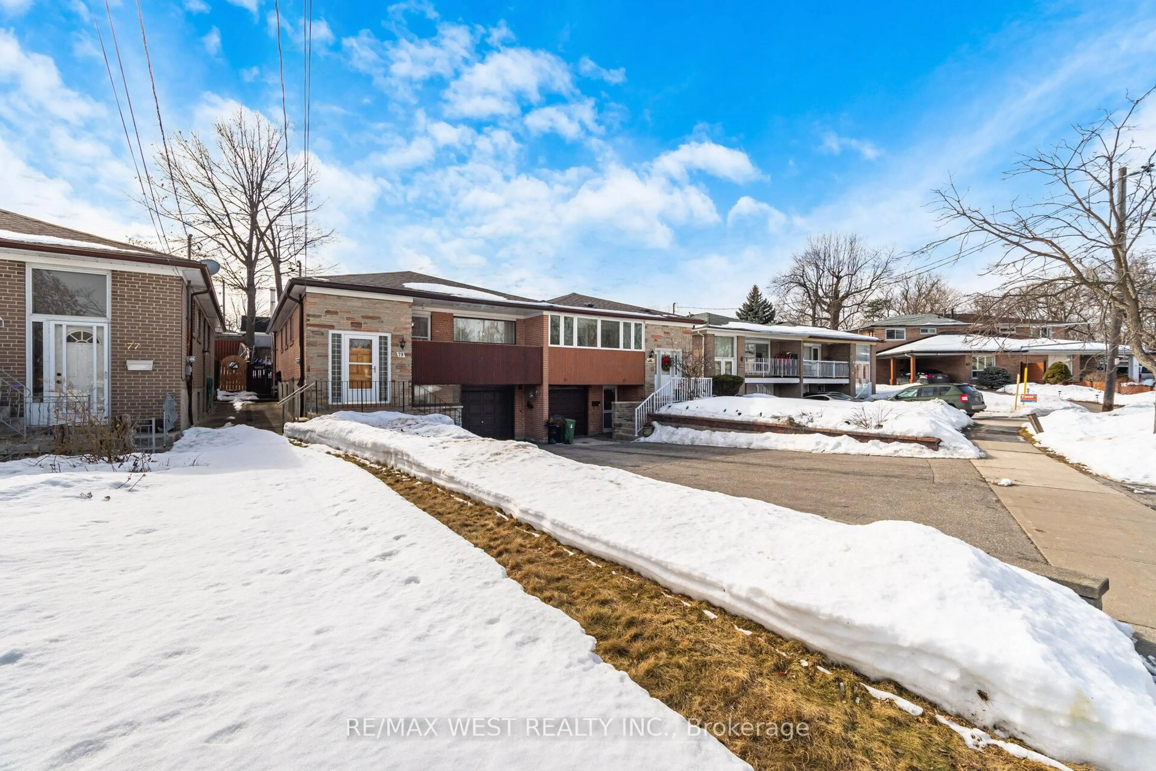 Home with brick exterior material, street for 79 Husband Dr, Toronto Ontario M9L 1J8