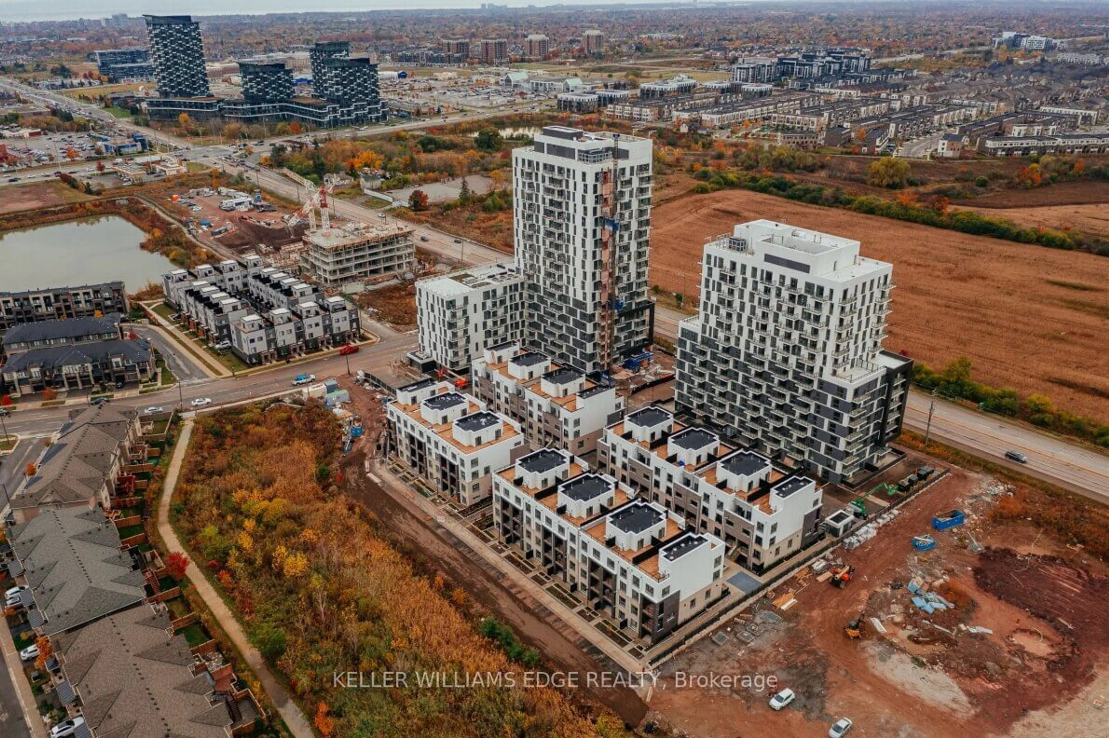 A pic from outside/outdoor area/front of a property/back of a property/a pic from drone, city buildings view from balcony for 349 Wheat Boom Dr #221, Oakville Ontario L6H 7X5