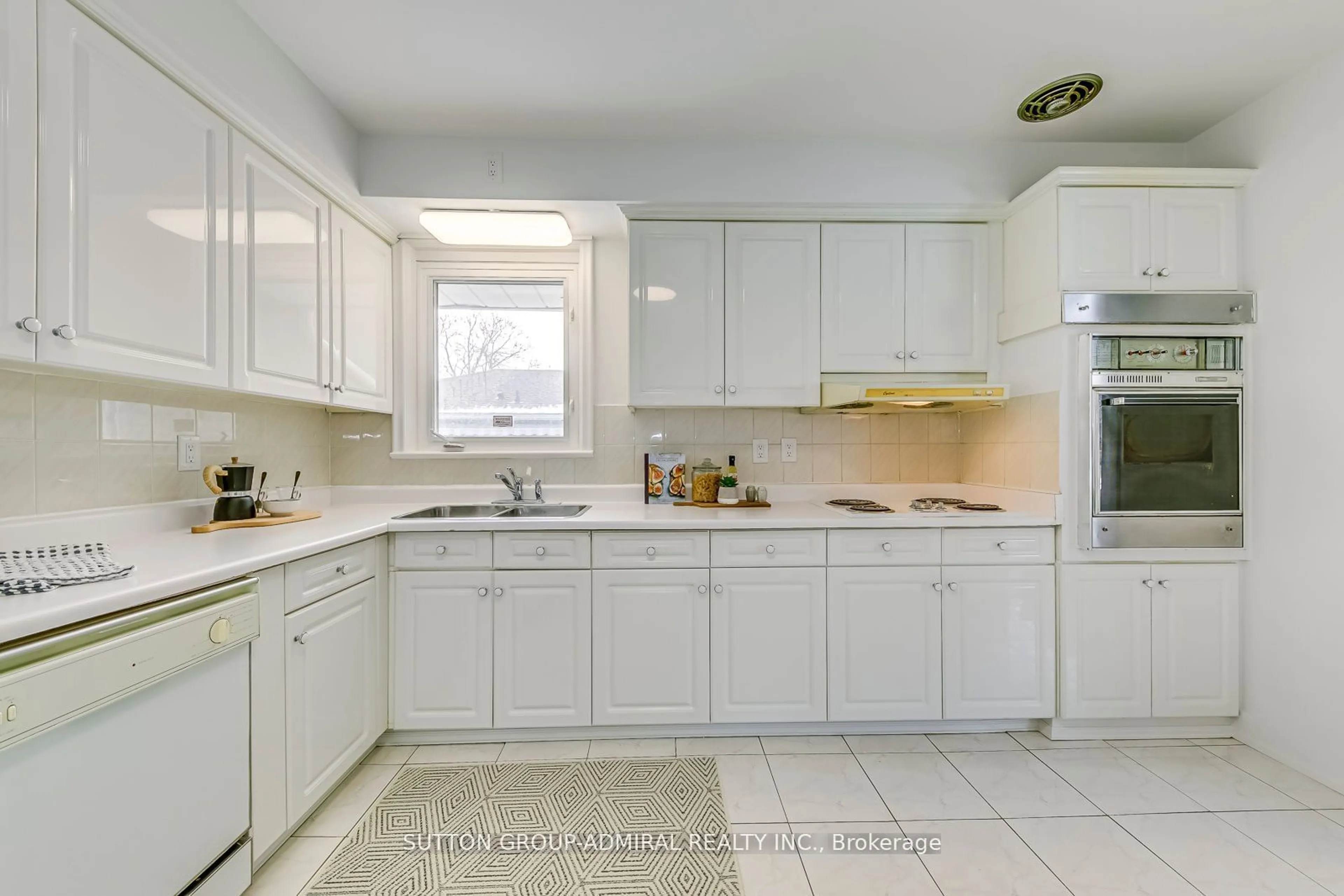 Standard kitchen, ceramic/tile floor for 25 Carsbrooke Rd, Toronto Ontario M9C 3C2