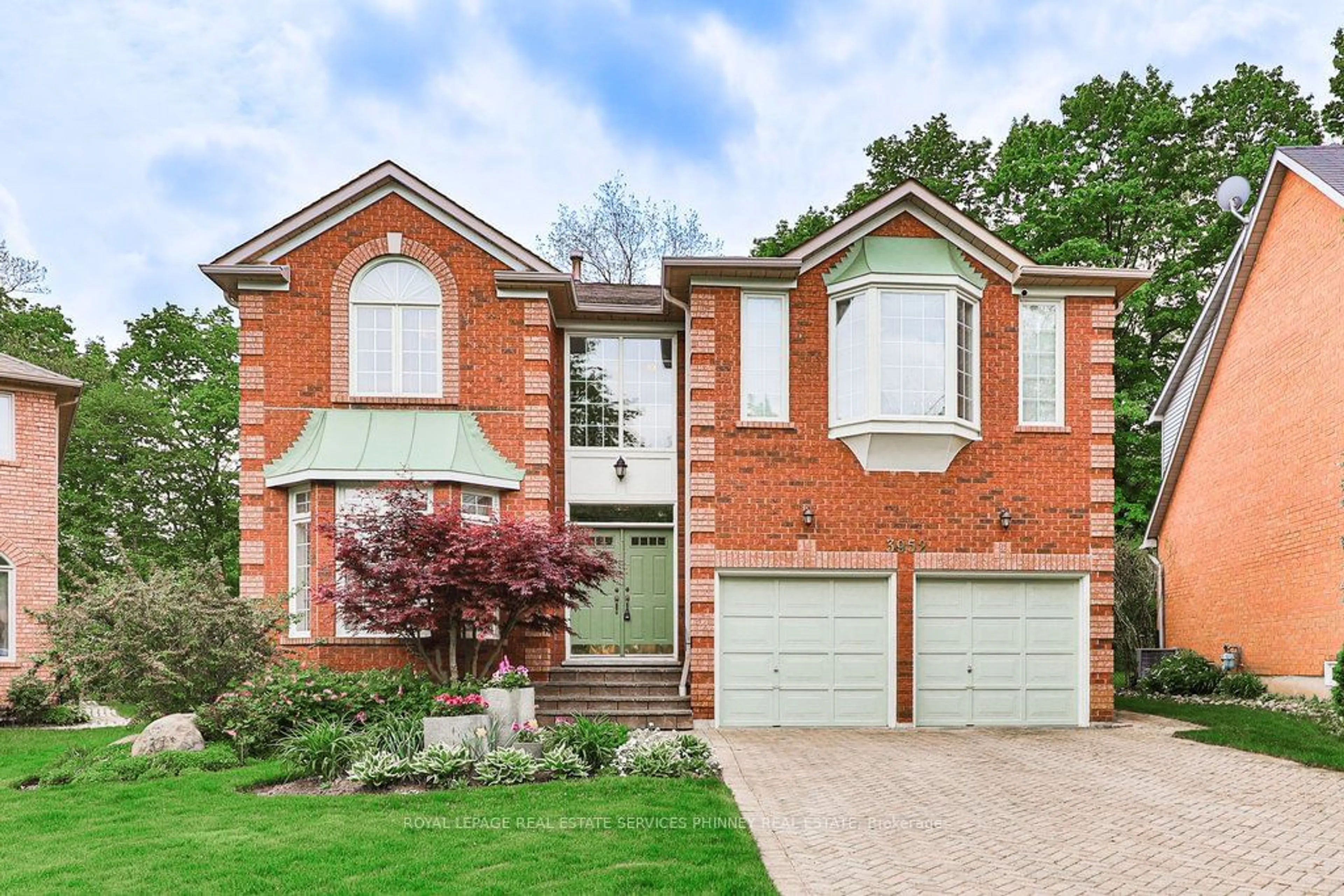 Home with brick exterior material, street for 3952 Rolling Valley Dr, Mississauga Ontario L5L 5V9