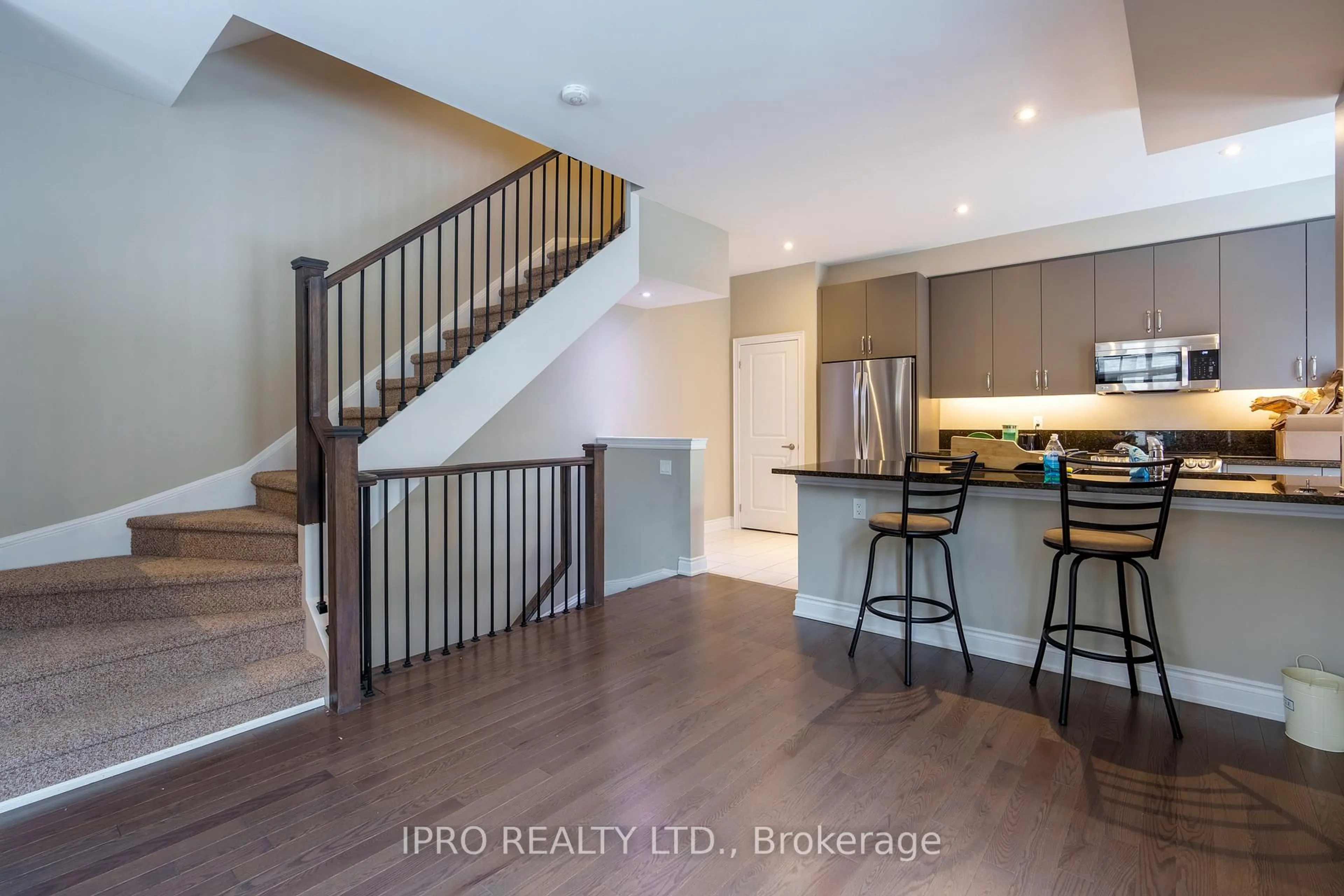 Open concept kitchen, wood/laminate floor for 50 Lunar Cres #156, Mississauga Ontario L5M 2R4