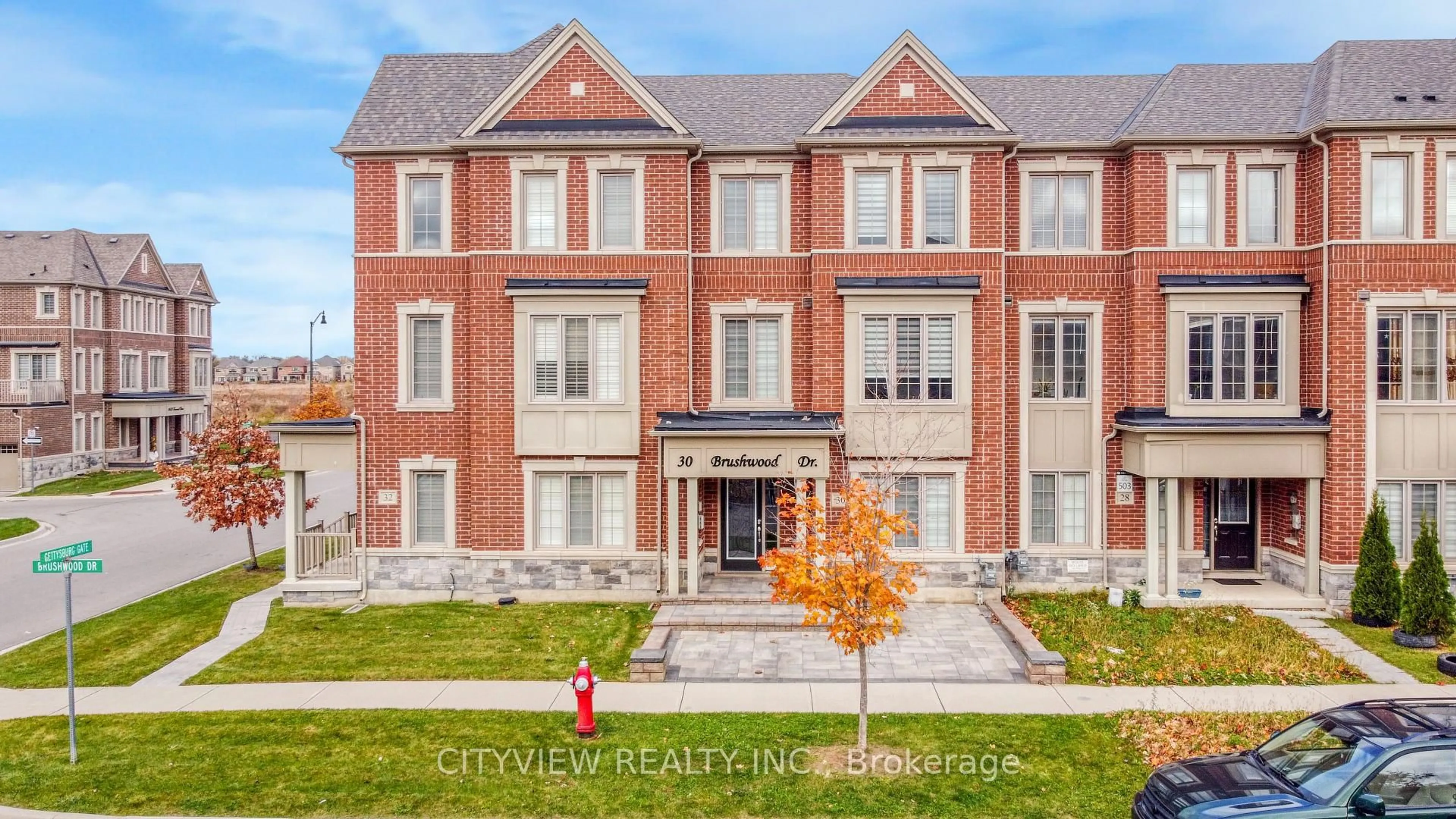 Home with brick exterior material, street for 30 Brushwood Dr, Brampton Ontario L6Y 0E3