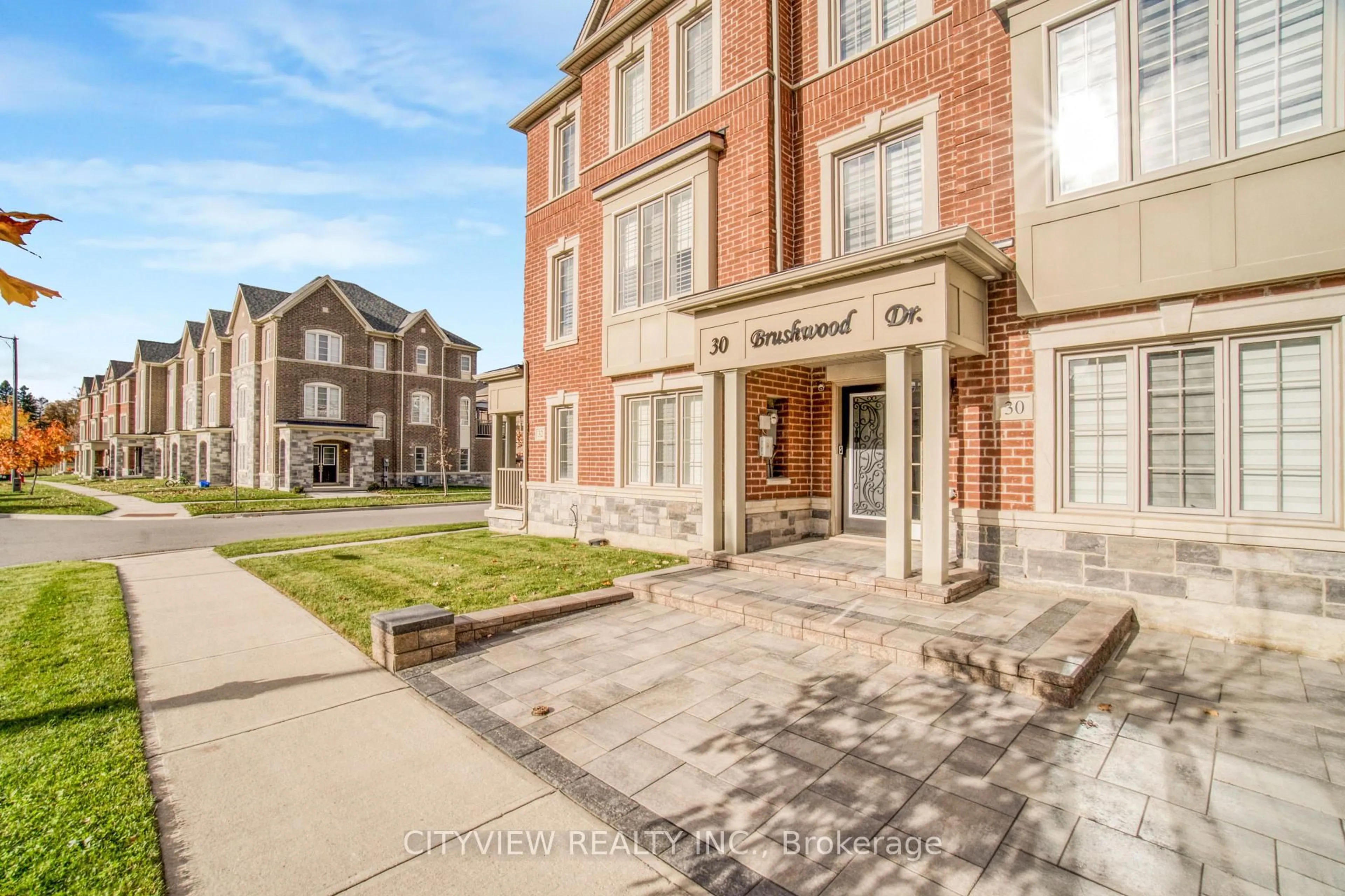 Home with brick exterior material, street for 30 Brushwood Dr, Brampton Ontario L6Y 0E3