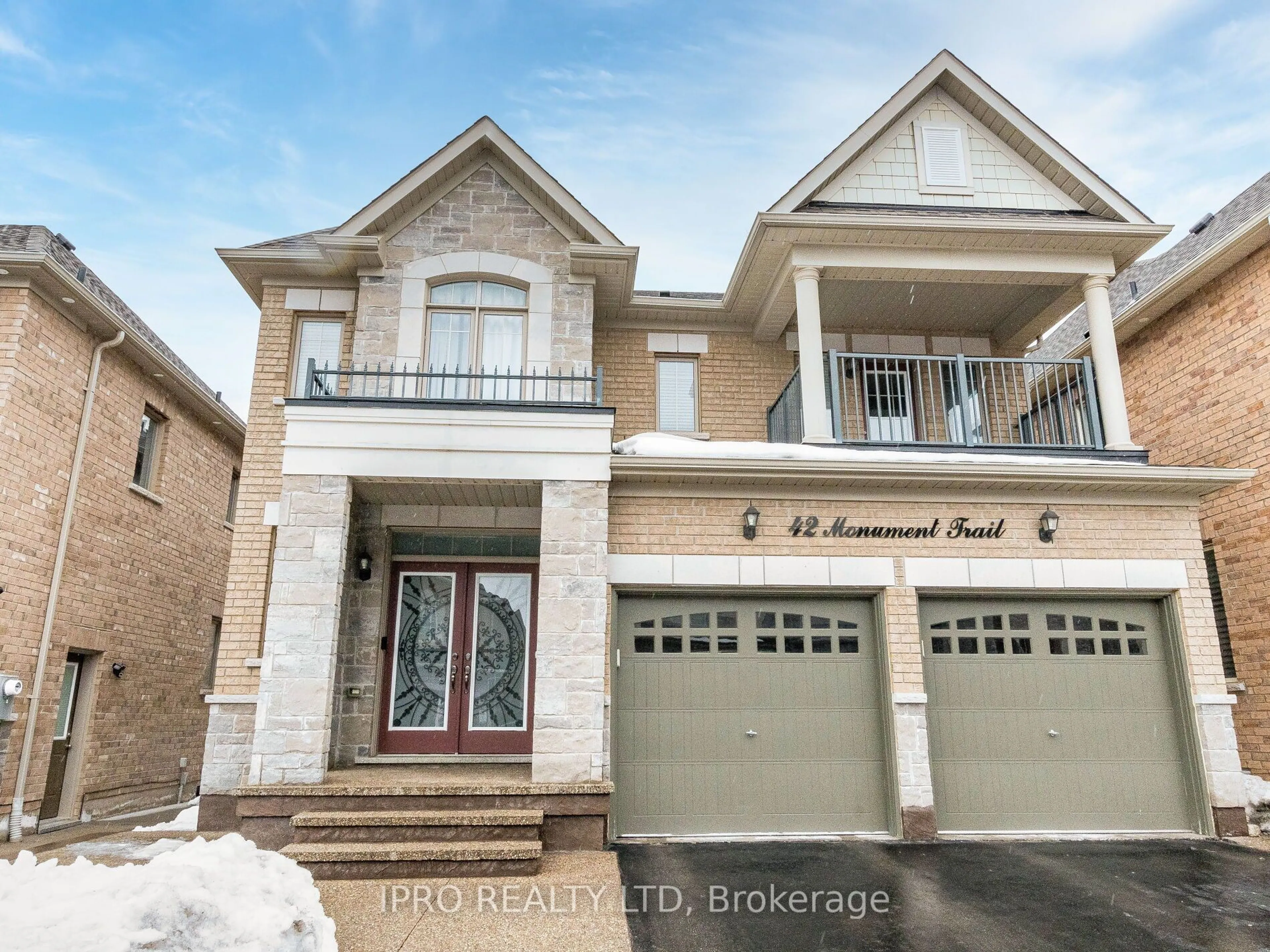 Home with brick exterior material, street for 42 Monument Tr, Brampton Ontario L7A 4M9