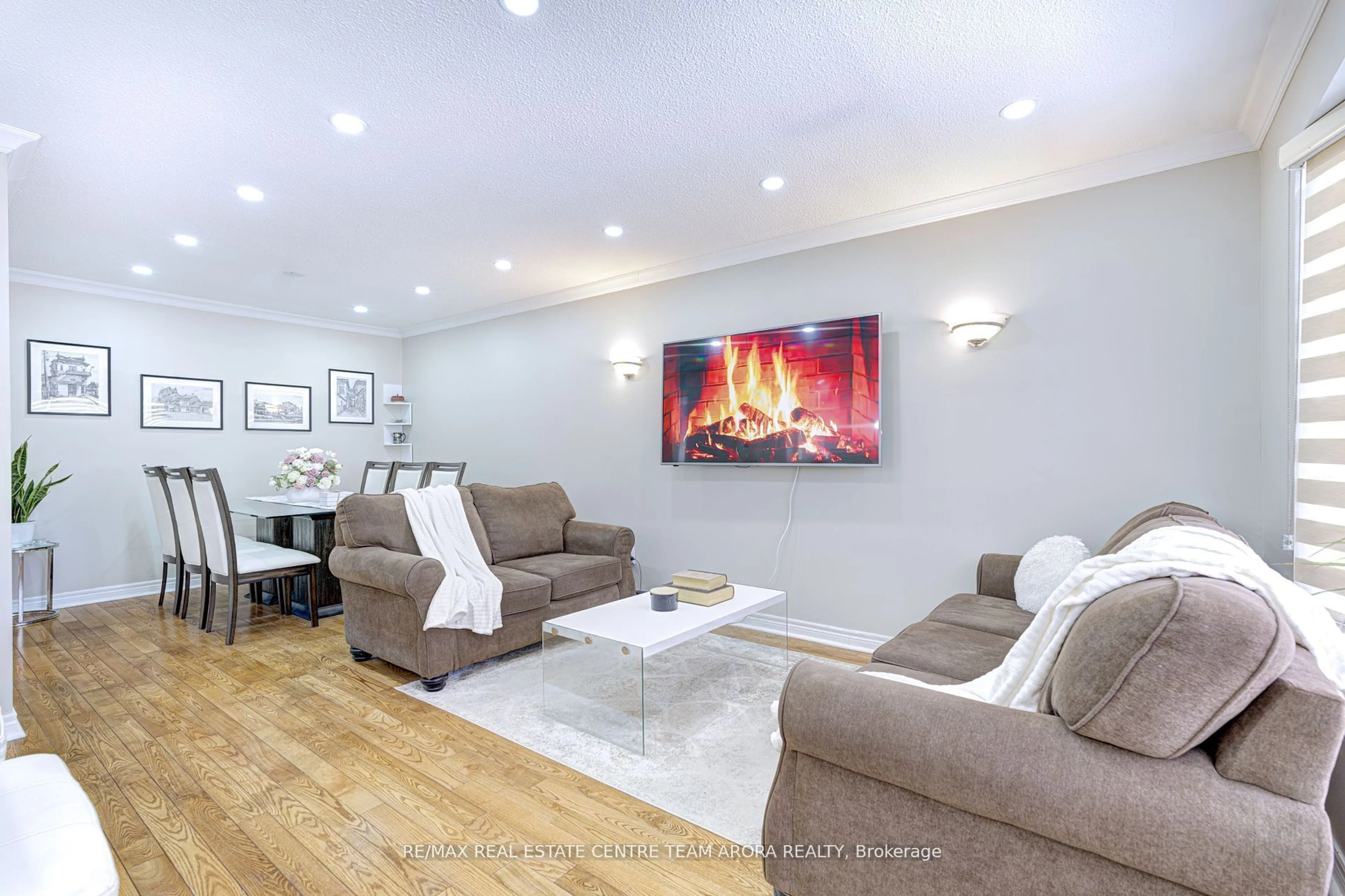 Living room with furniture, wood/laminate floor for 460 Ginger Dwns, Mississauga Ontario L5A 3A7