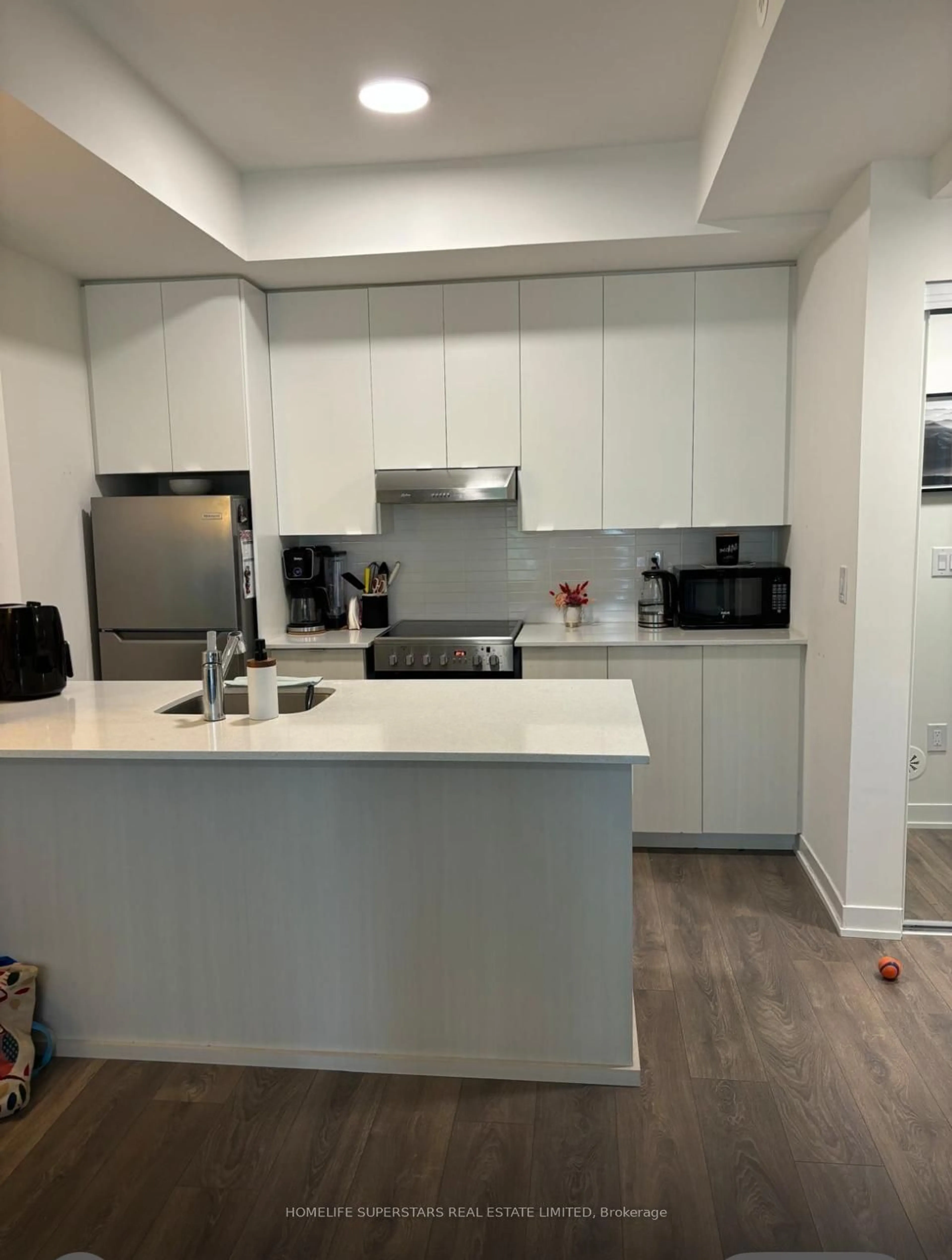 Open concept kitchen, unknown for 140 Canon Jackson Dr #111, Toronto Ontario M6M 0B9