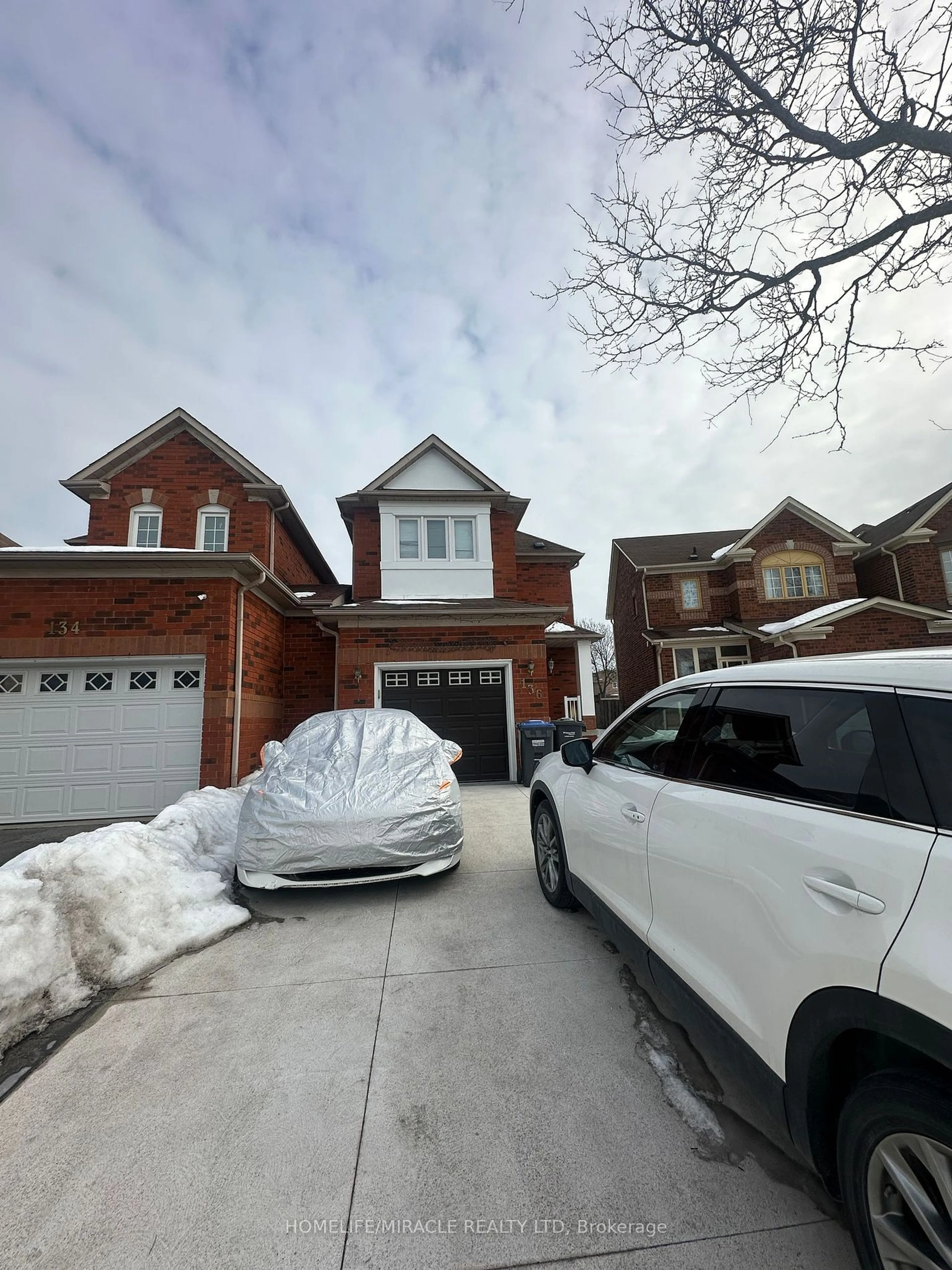 Home with brick exterior material, street for 136 Prairie Rose Circ, Brampton Ontario L6R 1R5