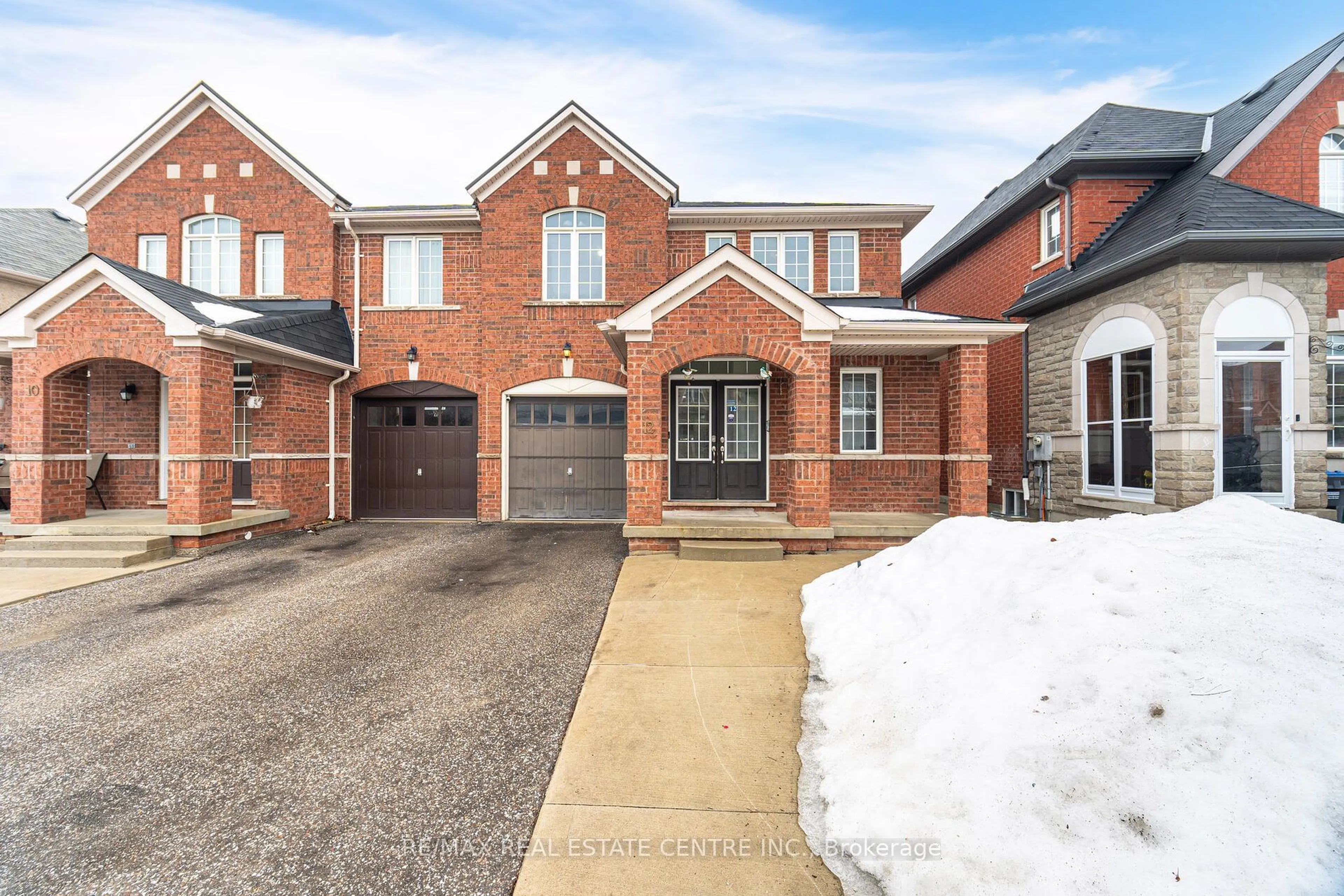 Home with brick exterior material, street for 12 Education Rd, Brampton Ontario L6P 3P2