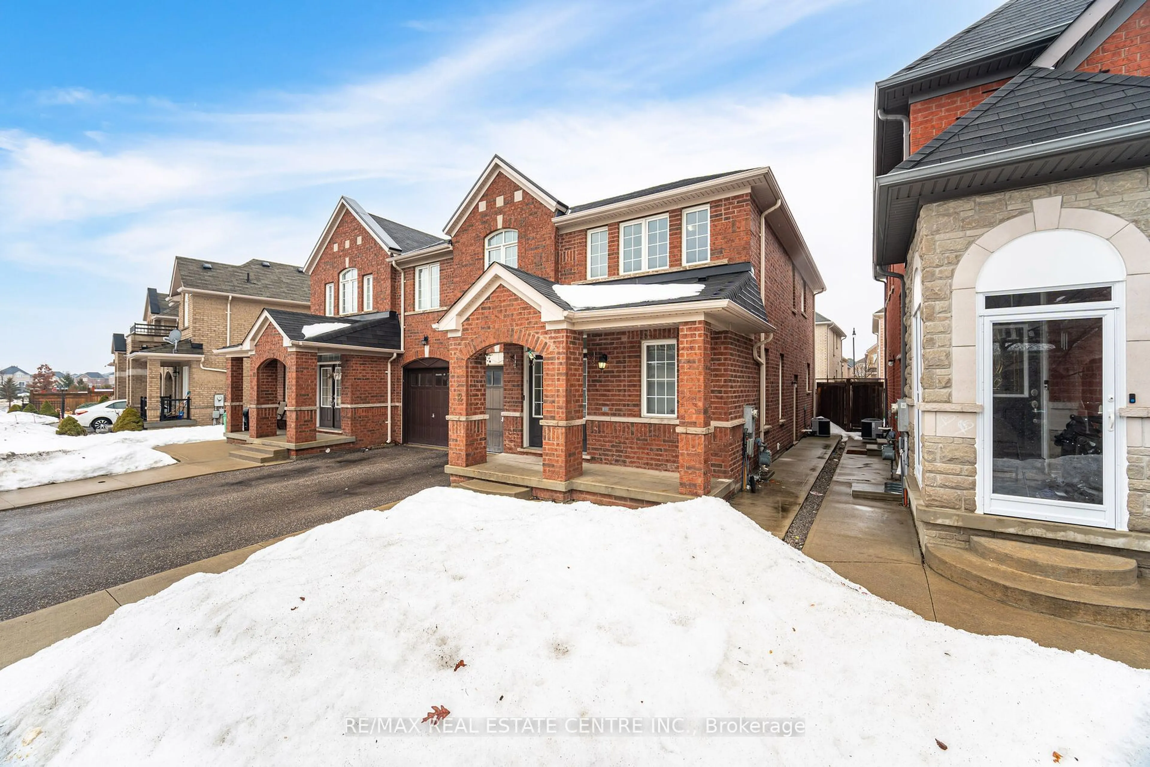 Home with brick exterior material, street for 12 Education Rd, Brampton Ontario L6P 3P2