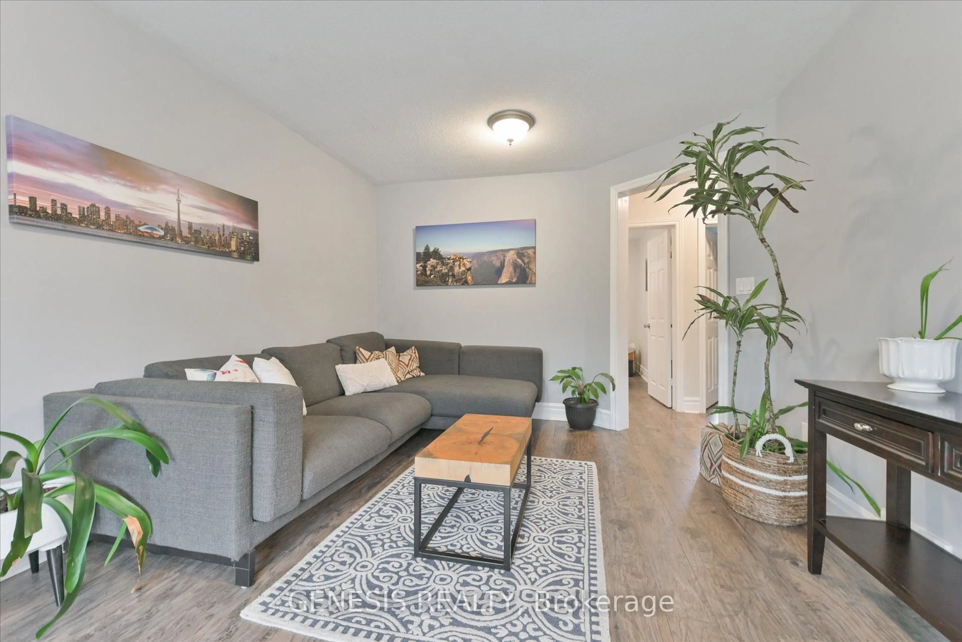 Living room with furniture, wood/laminate floor for 455 Caledonia Rd, Toronto Ontario M6E 4T9