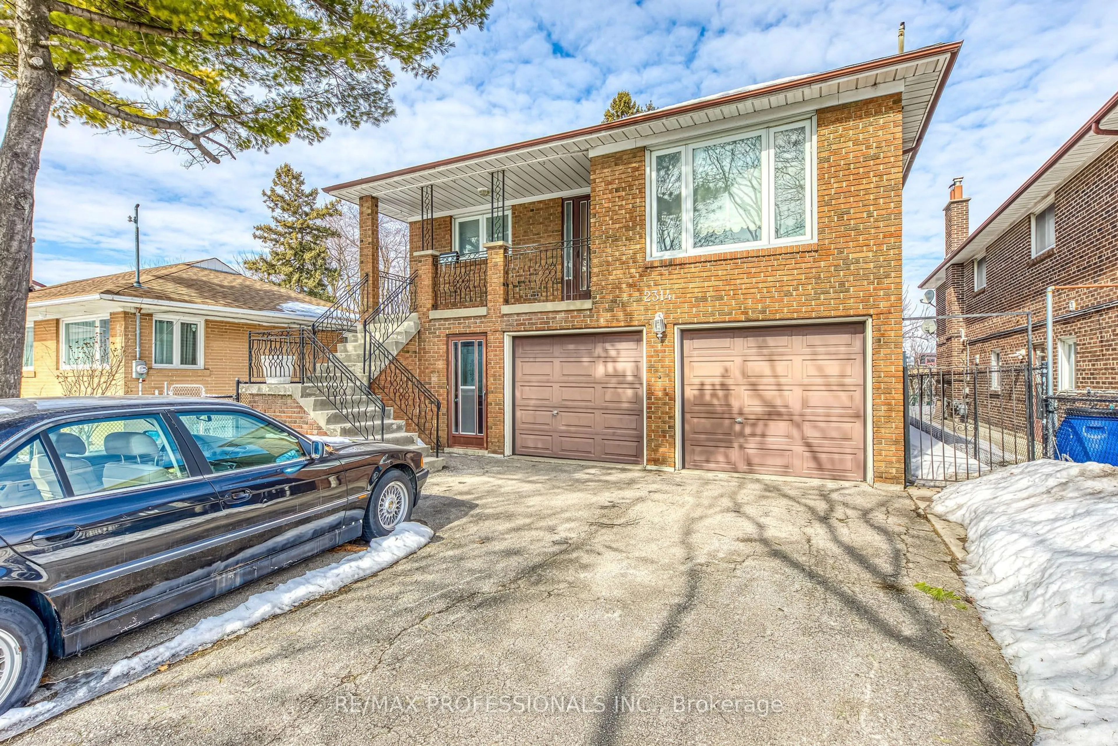 Home with brick exterior material, street for 2314 Sheppard Ave, Toronto Ontario M9M 1M2