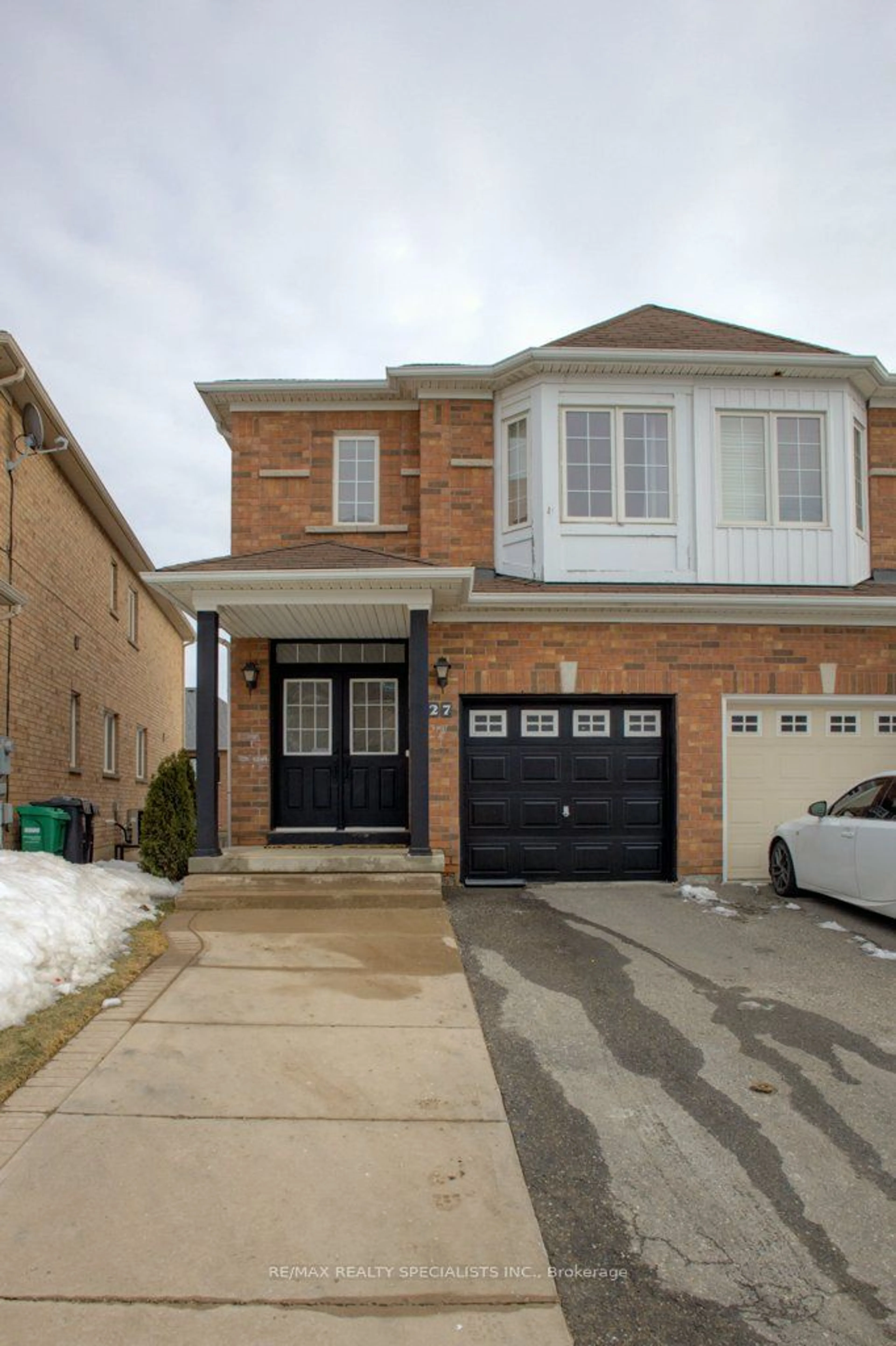 Home with brick exterior material, street for 27 Portrush Tr, Brampton Ontario L6X 0R2