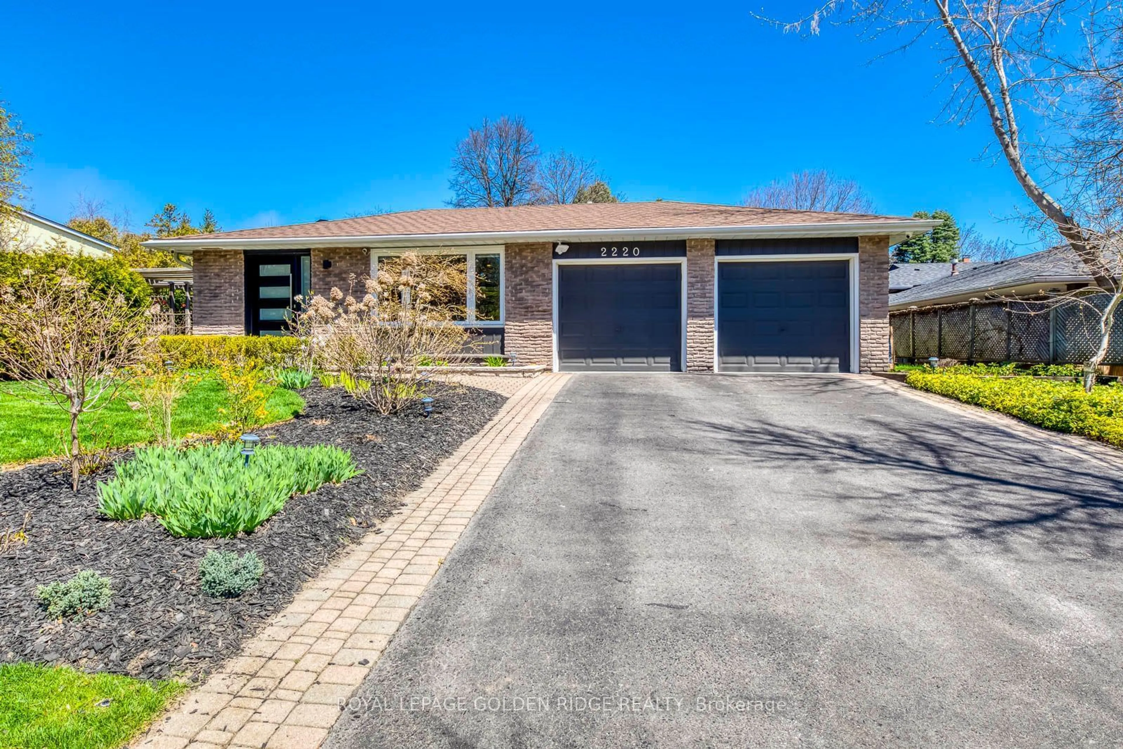 Home with brick exterior material, street for 2220 Elmhurst Ave, Oakville Ontario L6J 5G7