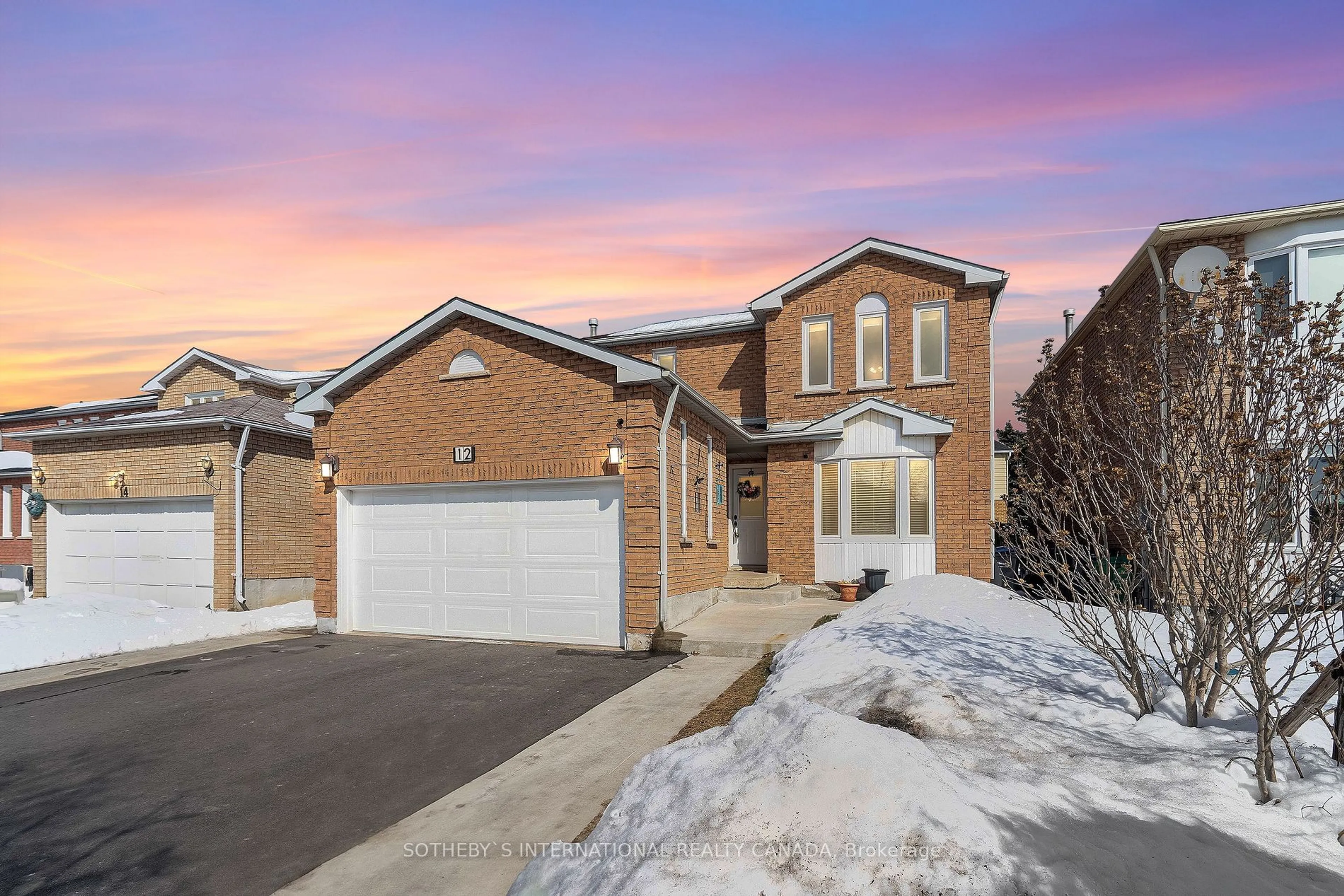 Home with brick exterior material, street for 12 Duggan Dr, Brampton Ontario L6Y 4K8