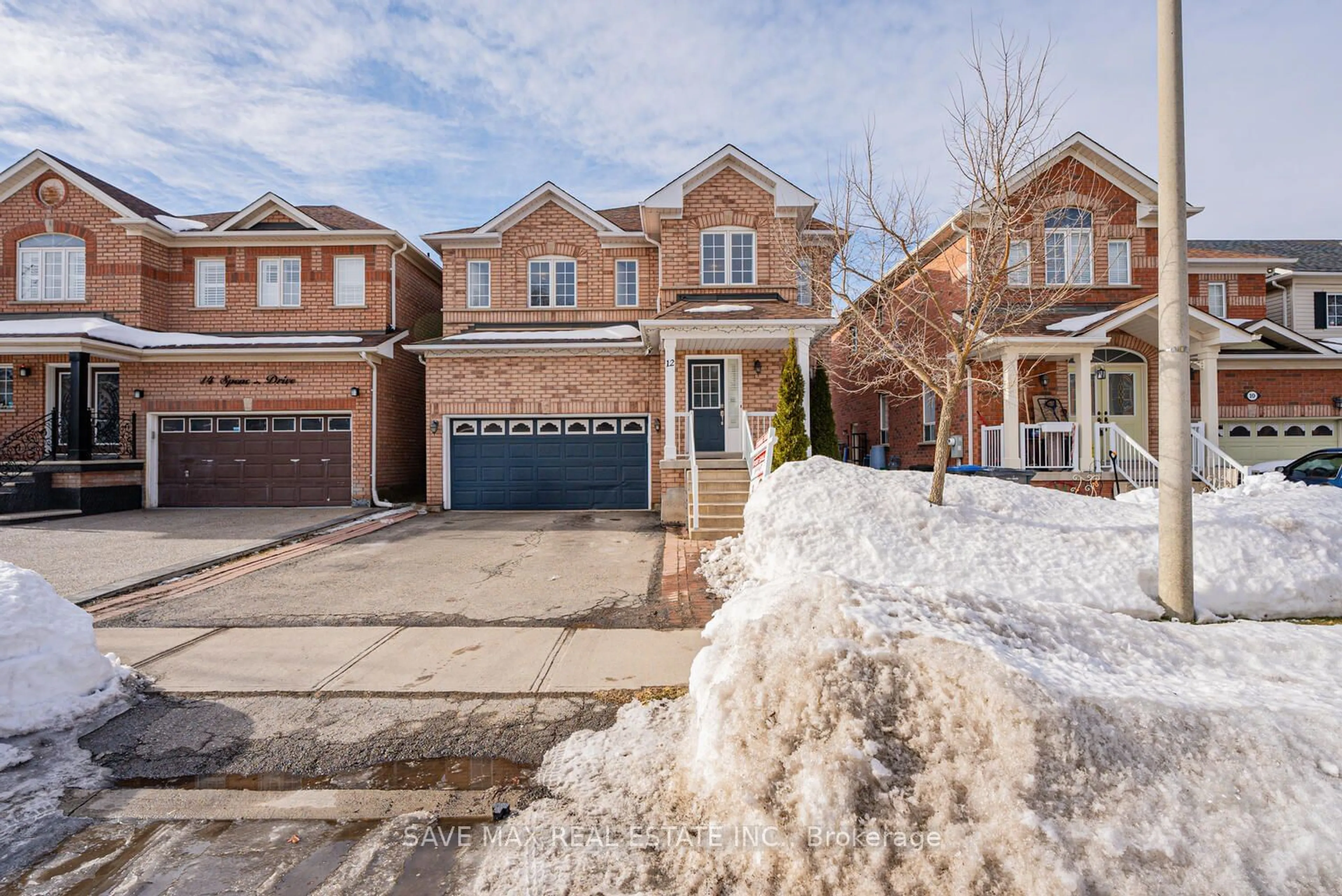 Home with brick exterior material, street for 12 Spencer Dr, Brampton Ontario L7A 2A4