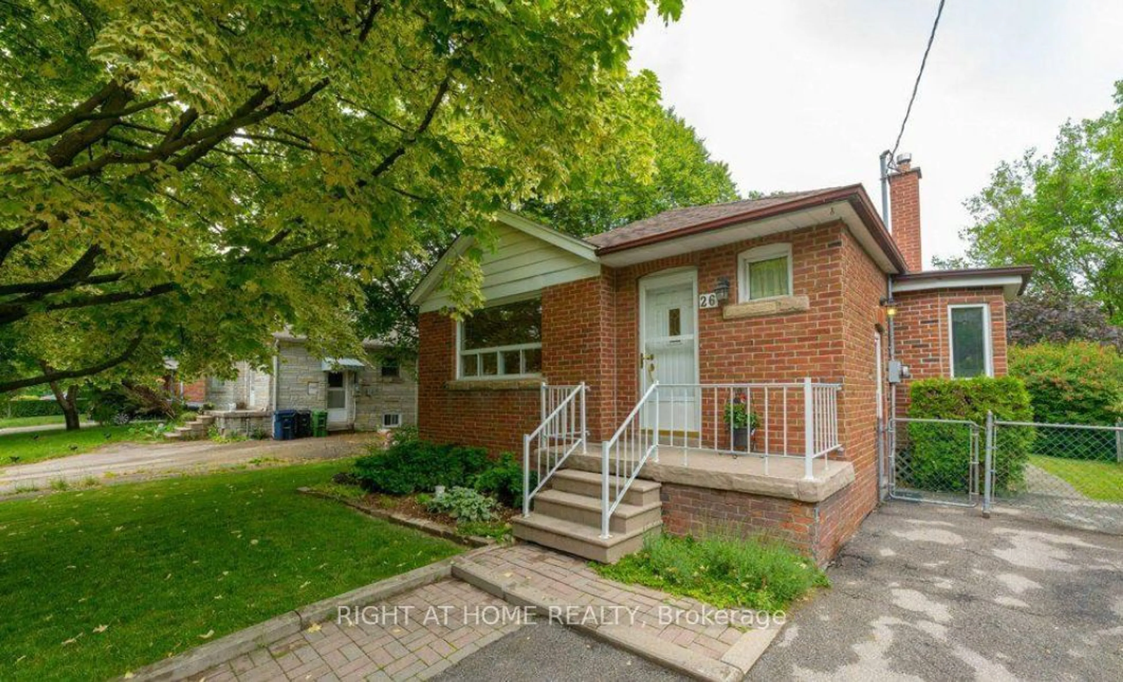 Home with brick exterior material, street for 26 Melody Rd, Toronto Ontario M9M 1C7