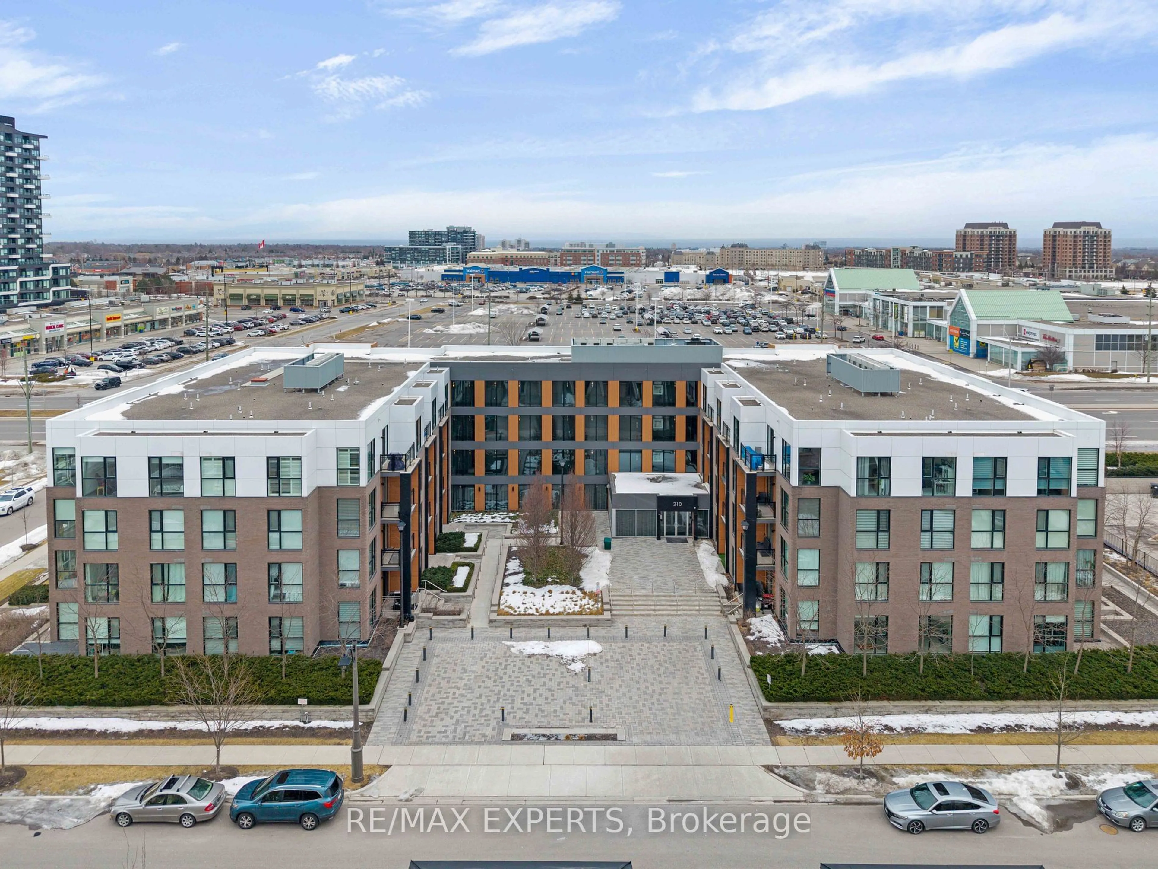 A pic from outside/outdoor area/front of a property/back of a property/a pic from drone, city buildings view from balcony for 210 Sabina Dr #208, Oakville Ontario L6H 0W6