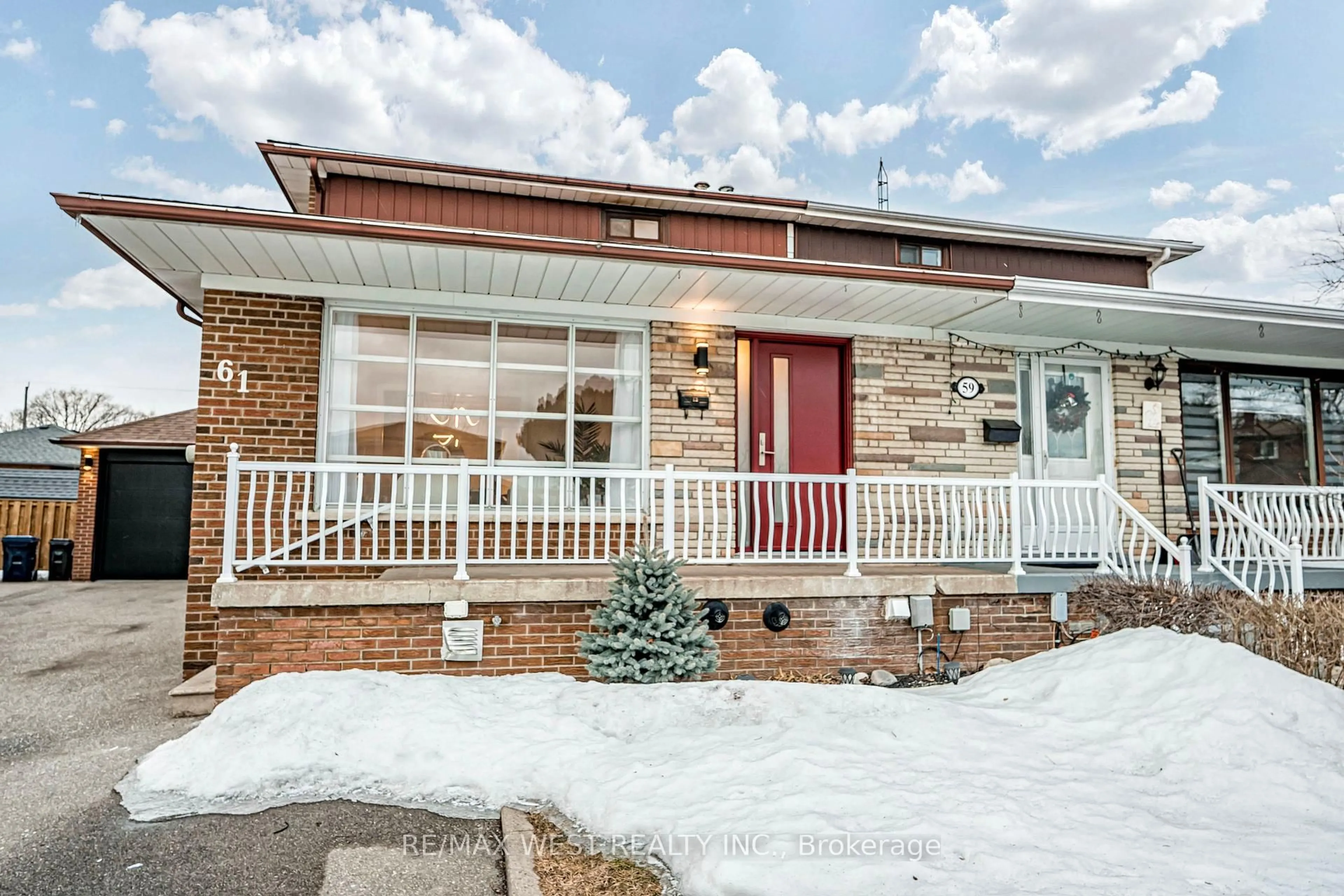 Home with brick exterior material, street for 61 Riverton Dr, Toronto Ontario M9L 2N8