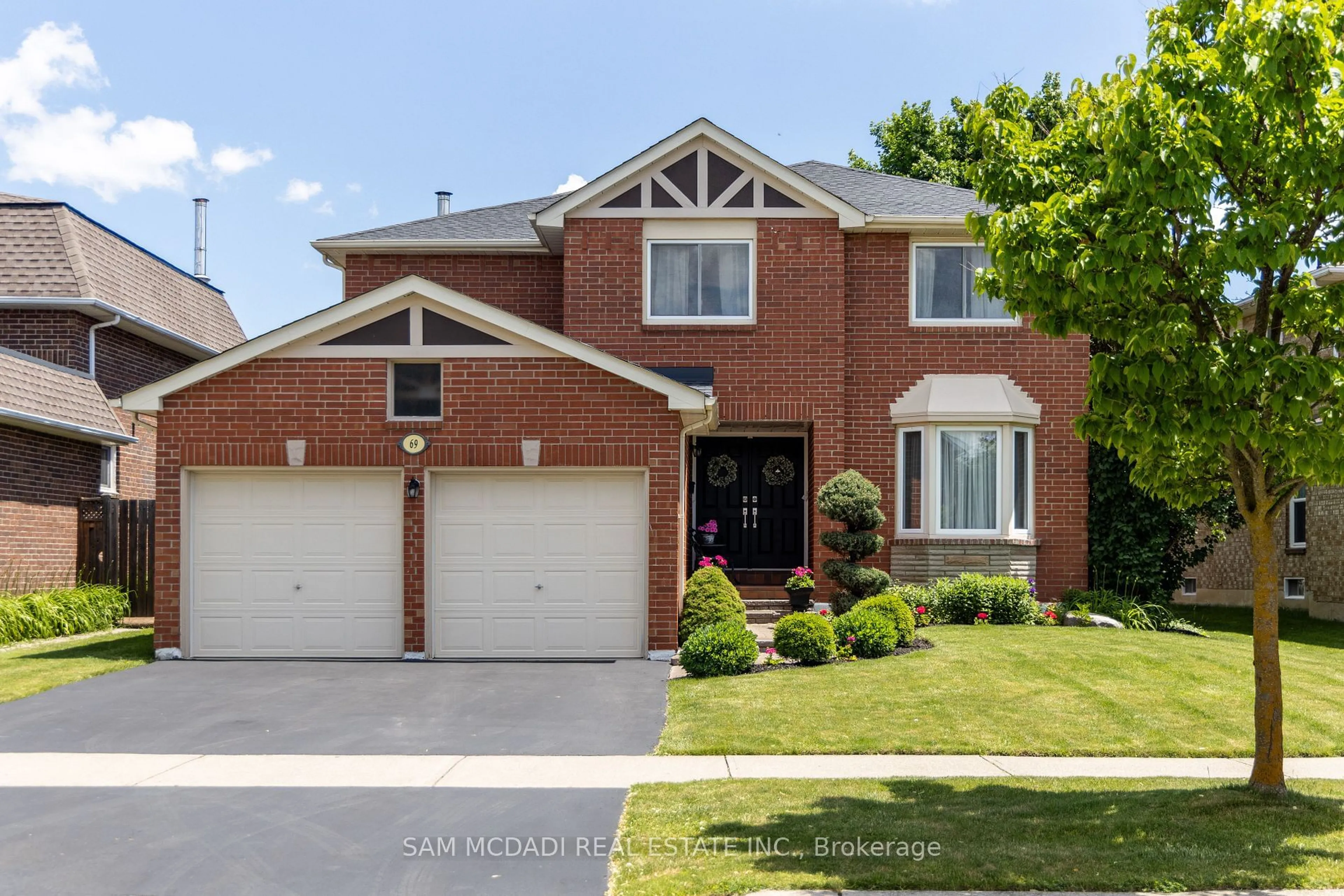 Home with brick exterior material, street for 69 Parkside Dr, Brampton Ontario L6Y 3A1