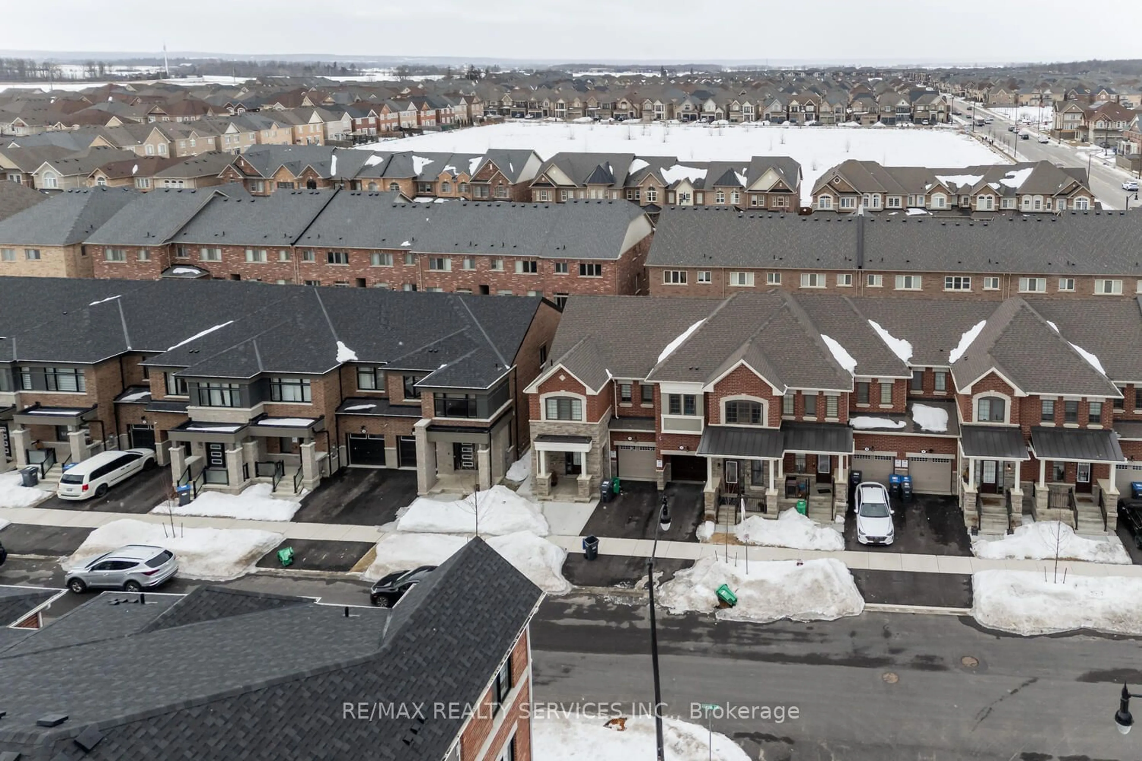 A pic from outside/outdoor area/front of a property/back of a property/a pic from drone, city buildings view from balcony for 12 Keppel Circ, Brampton Ontario L7A 5K4