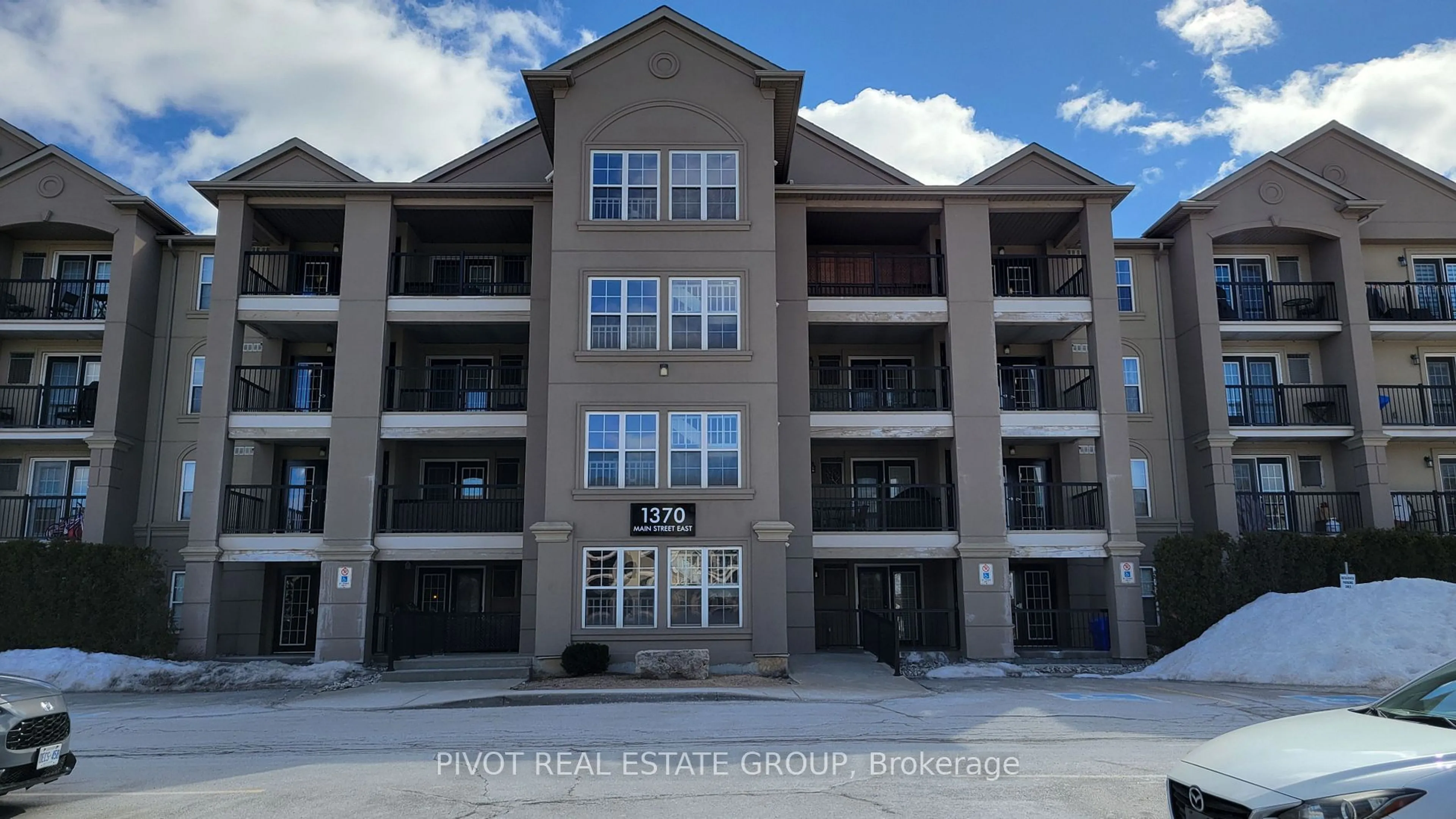 A pic from outside/outdoor area/front of a property/back of a property/a pic from drone, building for 1370 Main St #309, Milton Ontario L9T 7S8