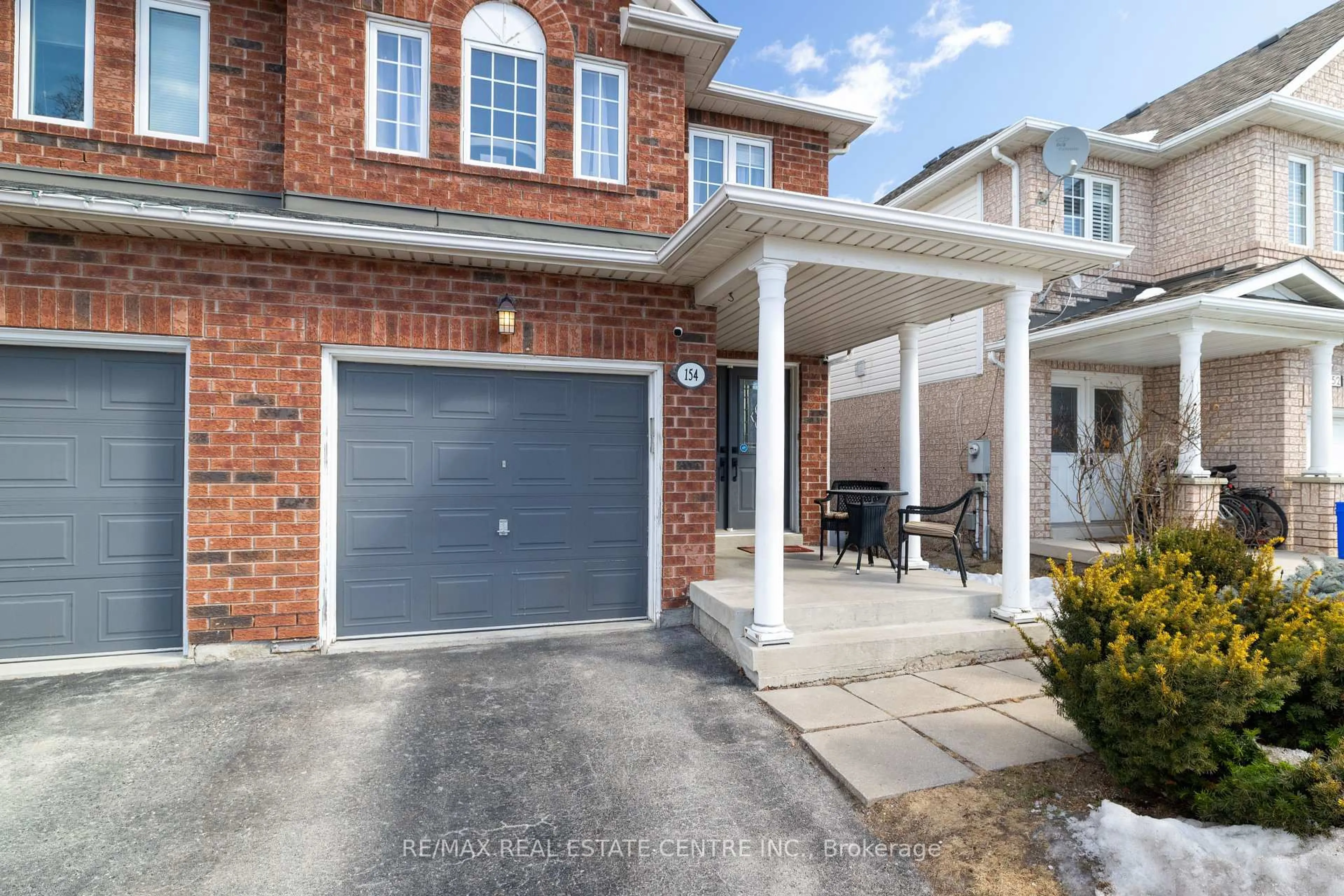 Home with brick exterior material, street for 154 Manley Lane, Milton Ontario L9T 5P1