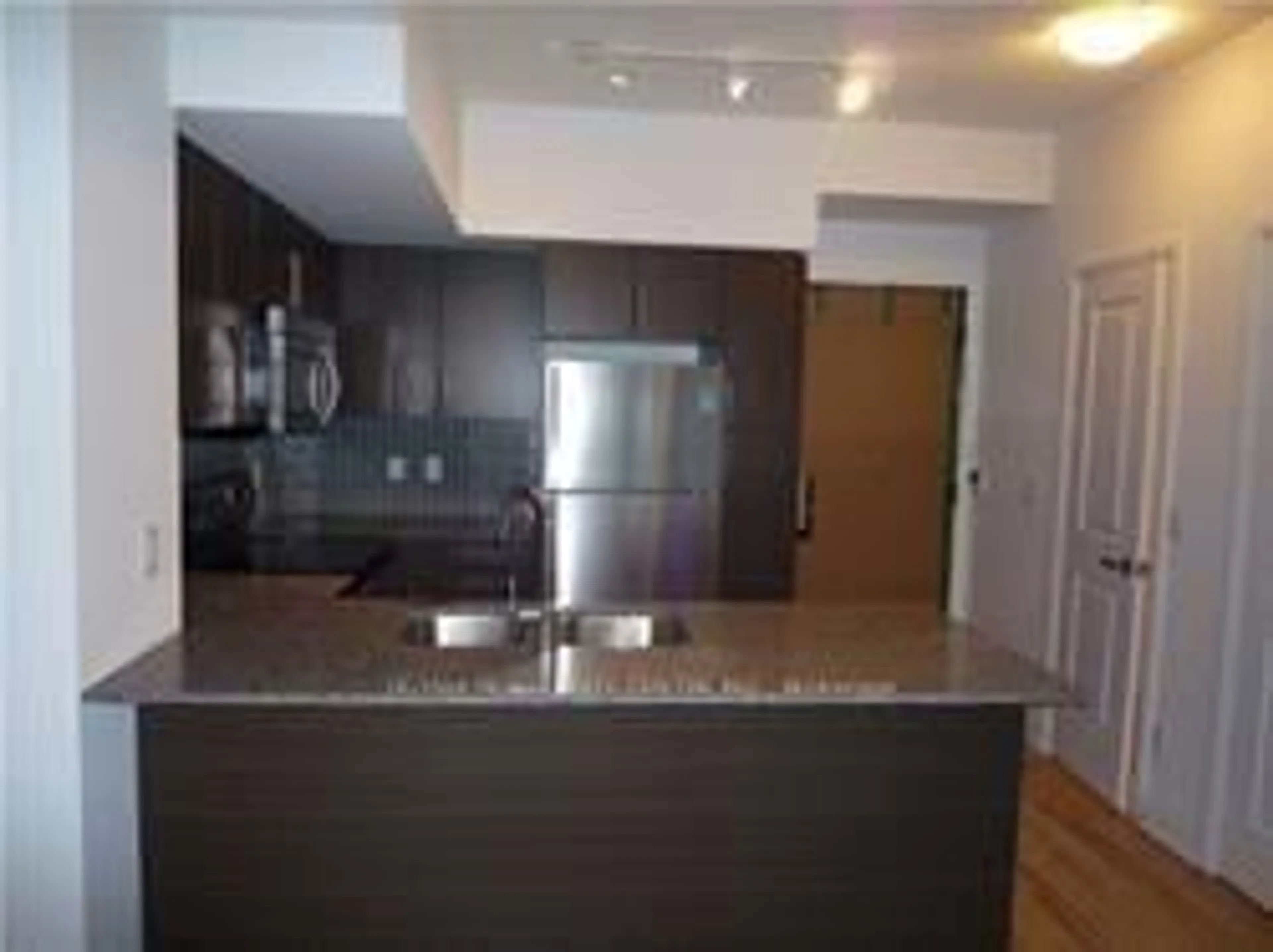 Open concept kitchen, unknown for 65 Speers Rd #407, Oakville Ontario L6K 0J1