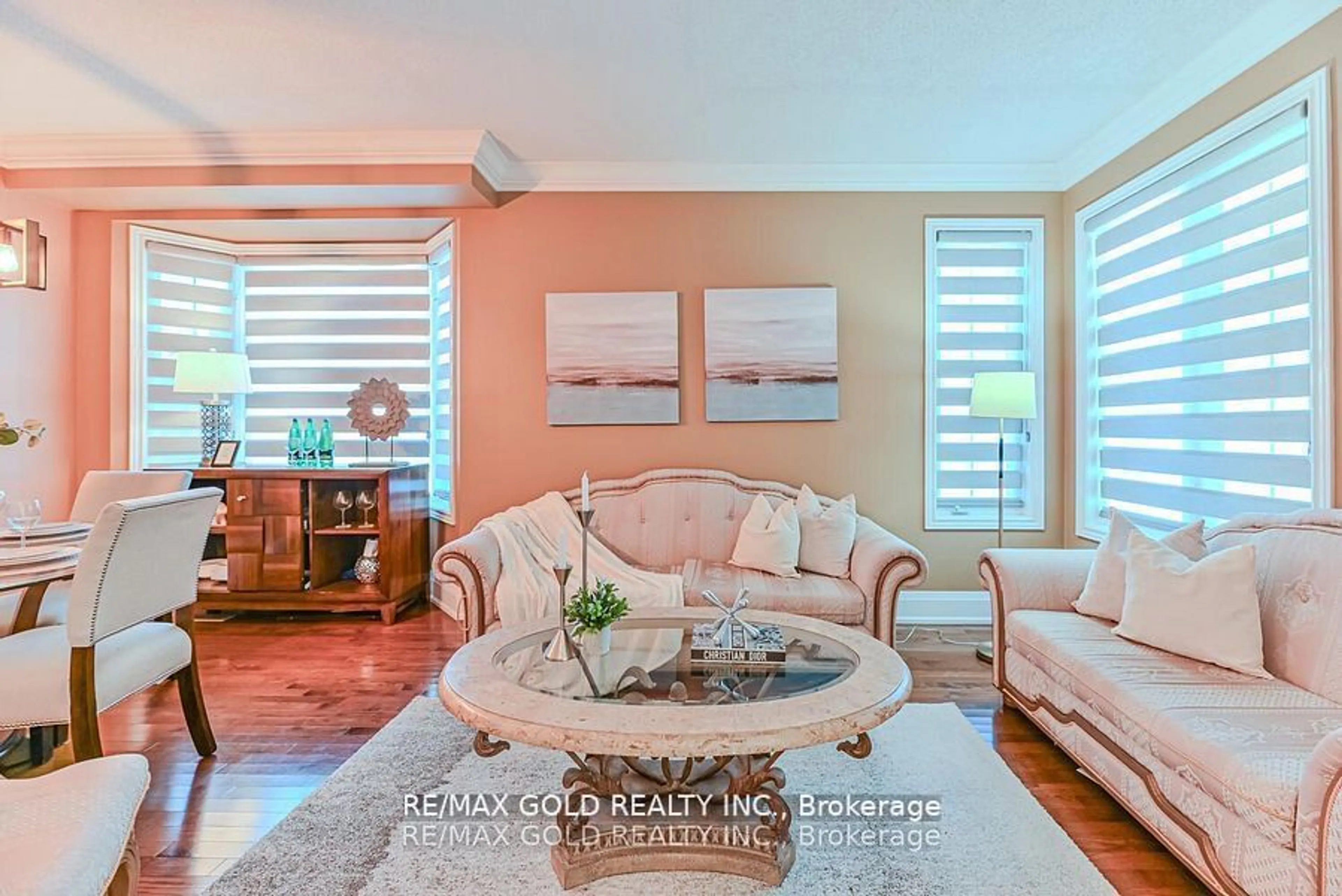 Living room with furniture, ceramic/tile floor for 107 Sled Dog Rd, Brampton Ontario L6R 0J4