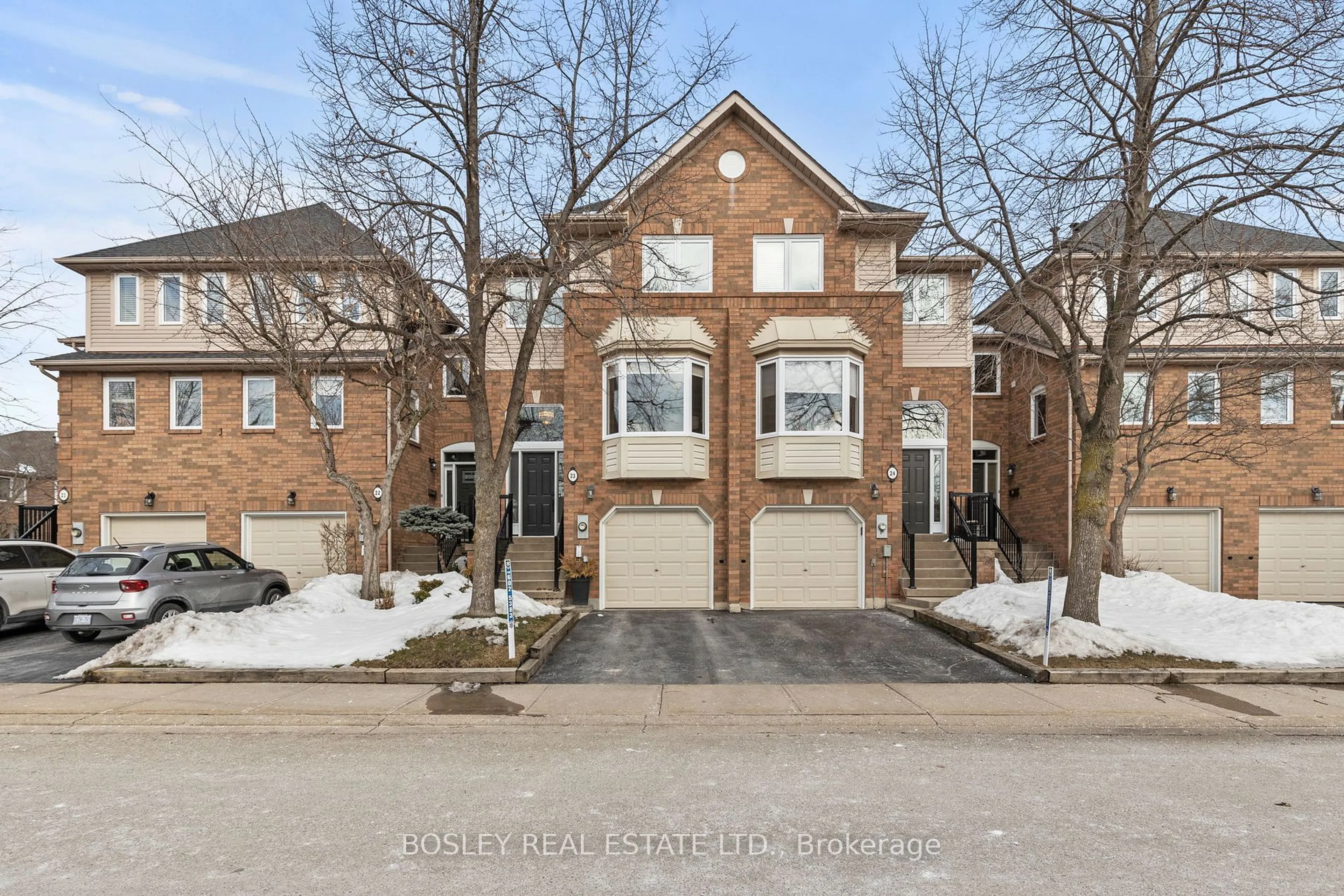 Home with brick exterior material, street for 2051 Merchants Gate #23, Oakville Ontario L6M 3H6