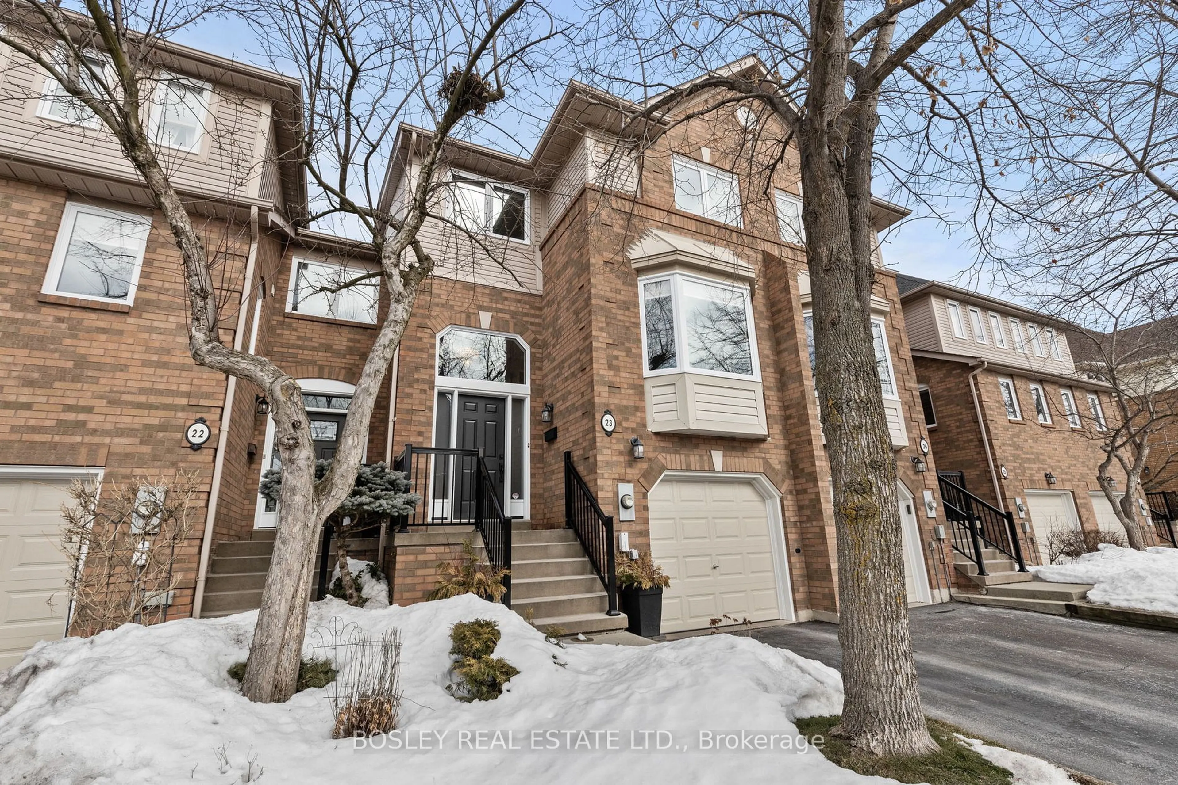 Home with brick exterior material, street for 2051 Merchants Gate #23, Oakville Ontario L6M 3H6