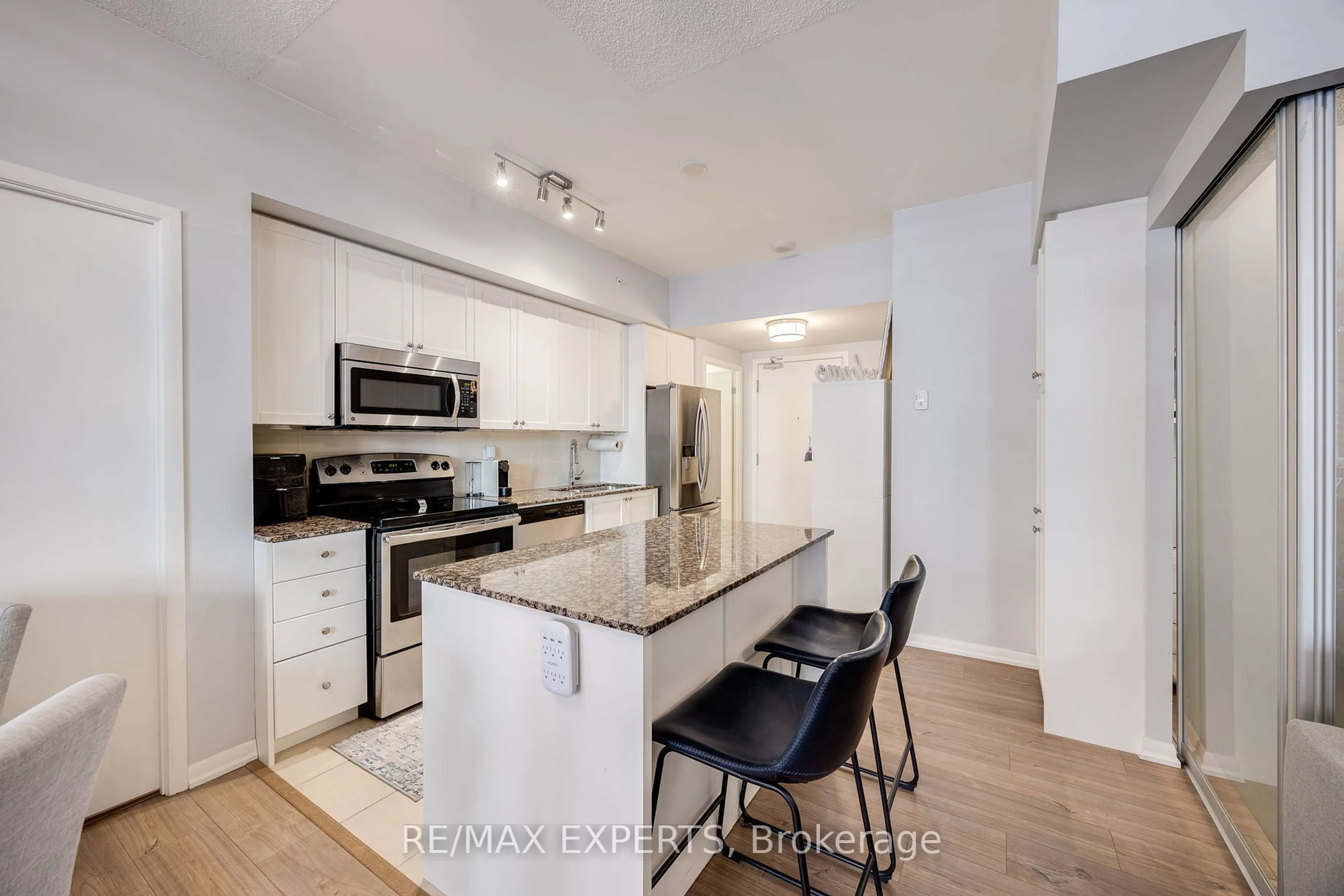 Open concept kitchen, unknown for 830 Lawrence Ave #231, Toronto Ontario M6A 0A2