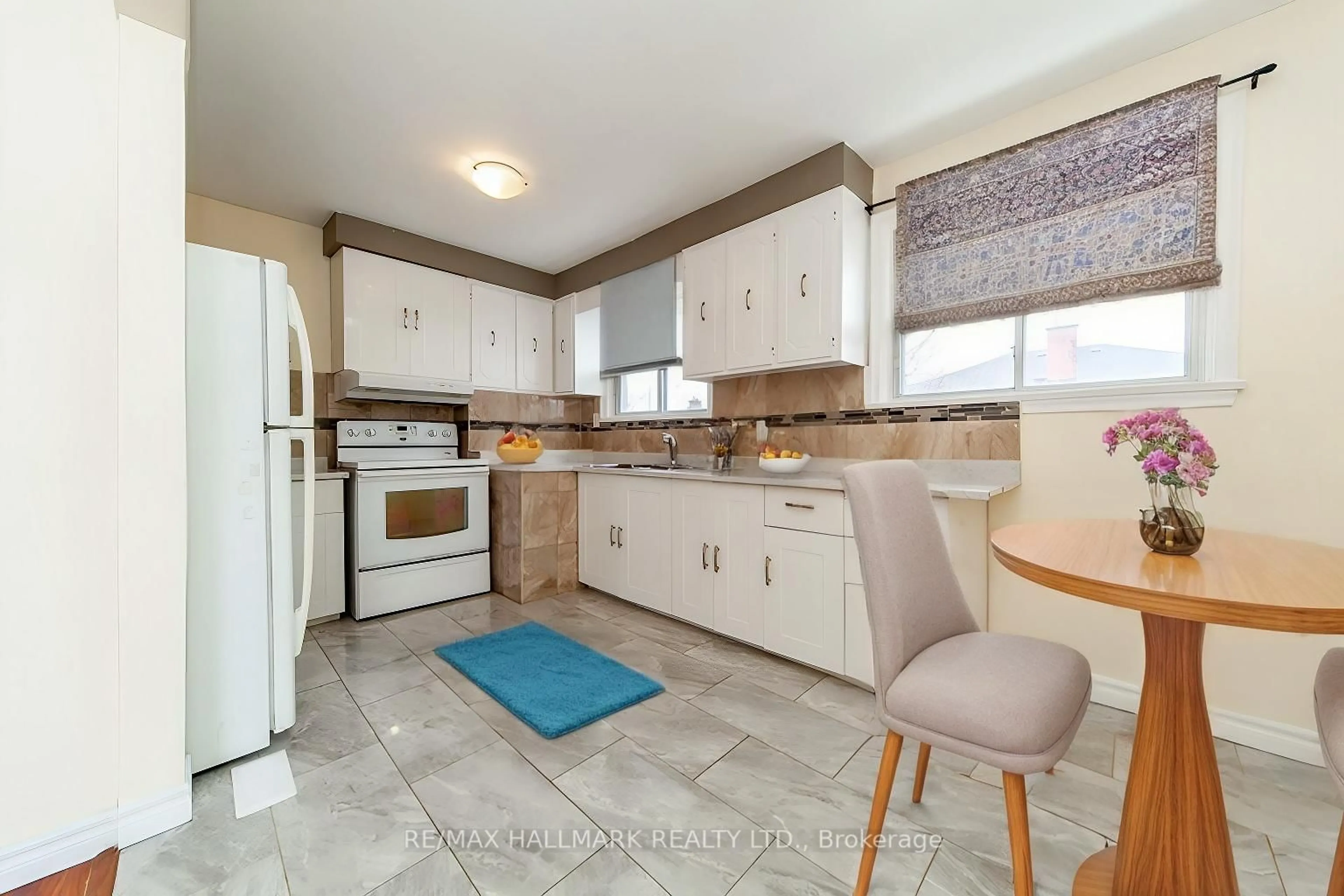 Standard kitchen, ceramic/tile floor for 86 Snowood Crt, Toronto Ontario M3N 1E8