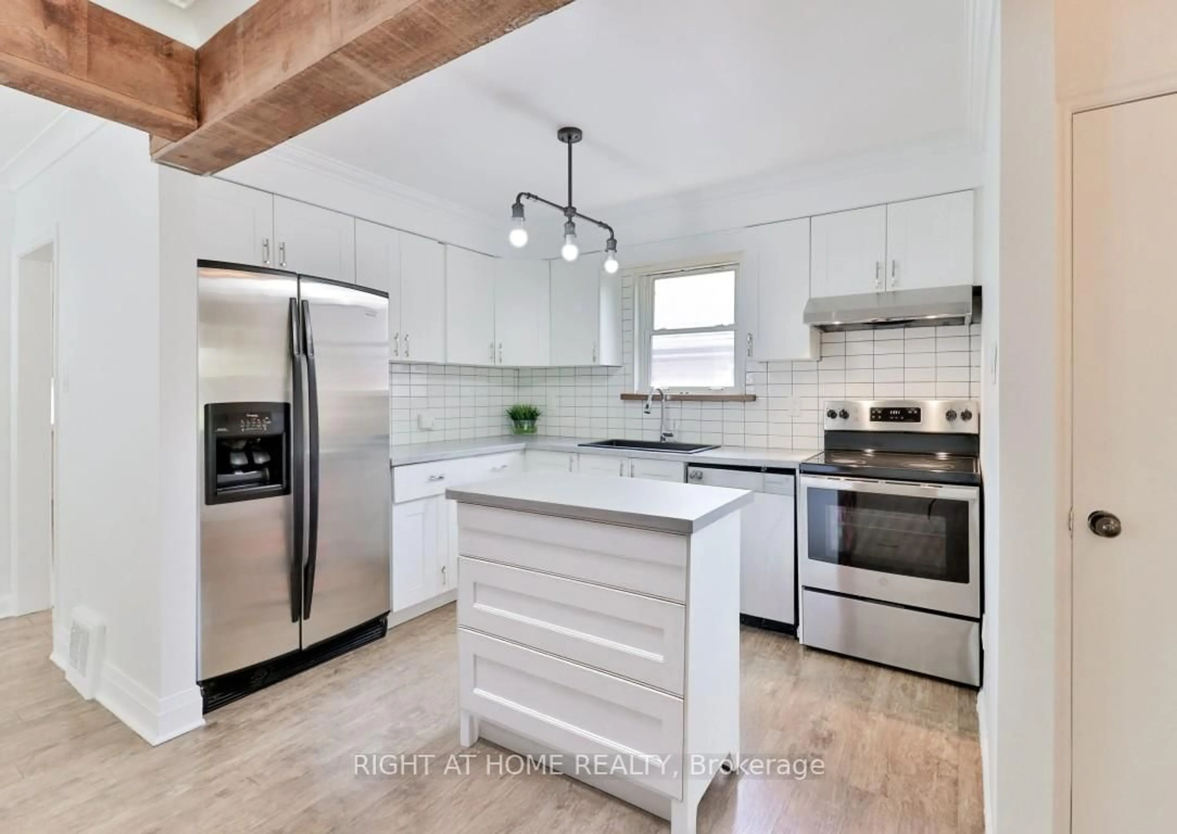 Open concept kitchen, unknown for 43 Bertram St, Toronto Ontario M6M 3S5