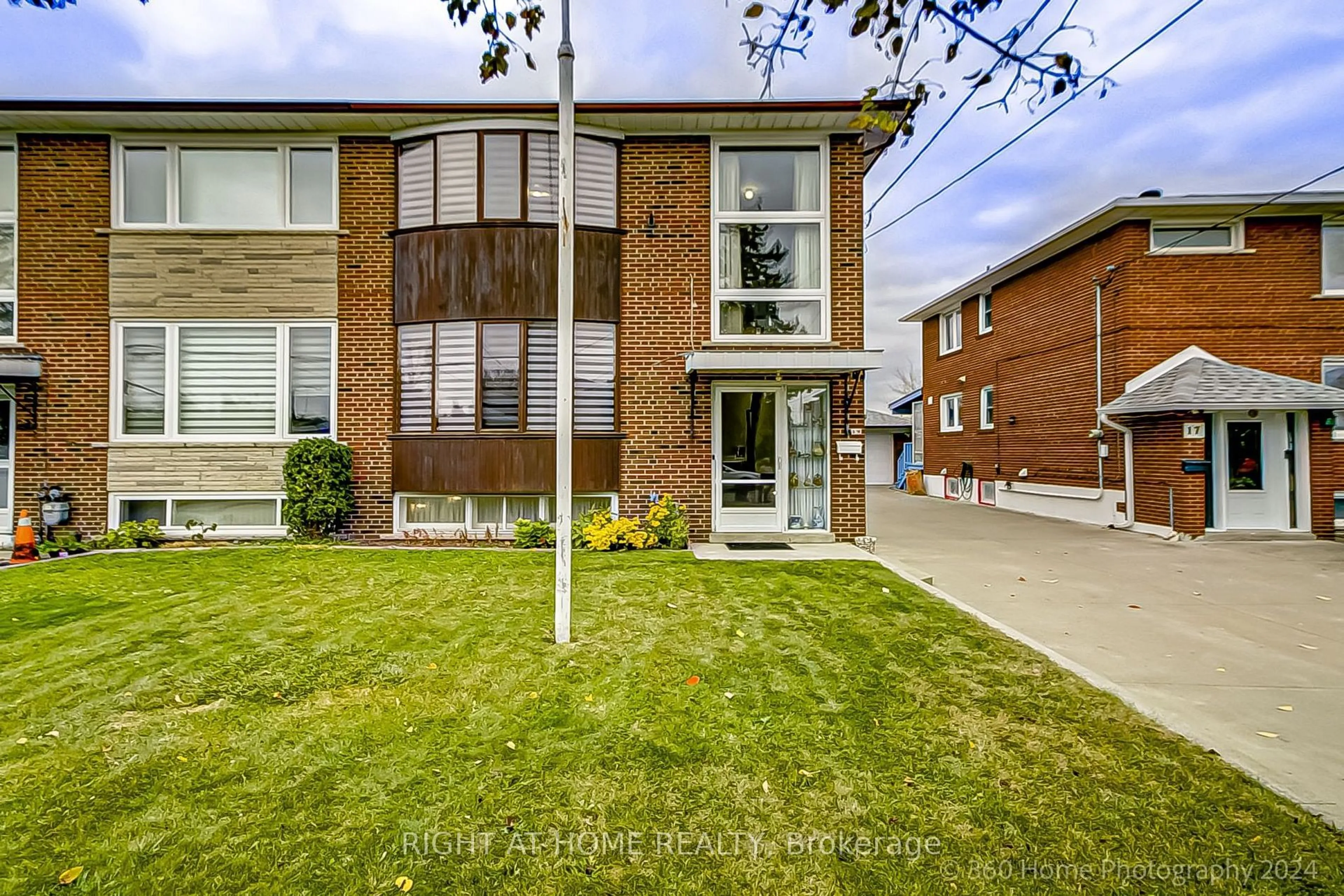 Home with brick exterior material, street for 19 Martini Dr, Toronto Ontario M6M 4X4