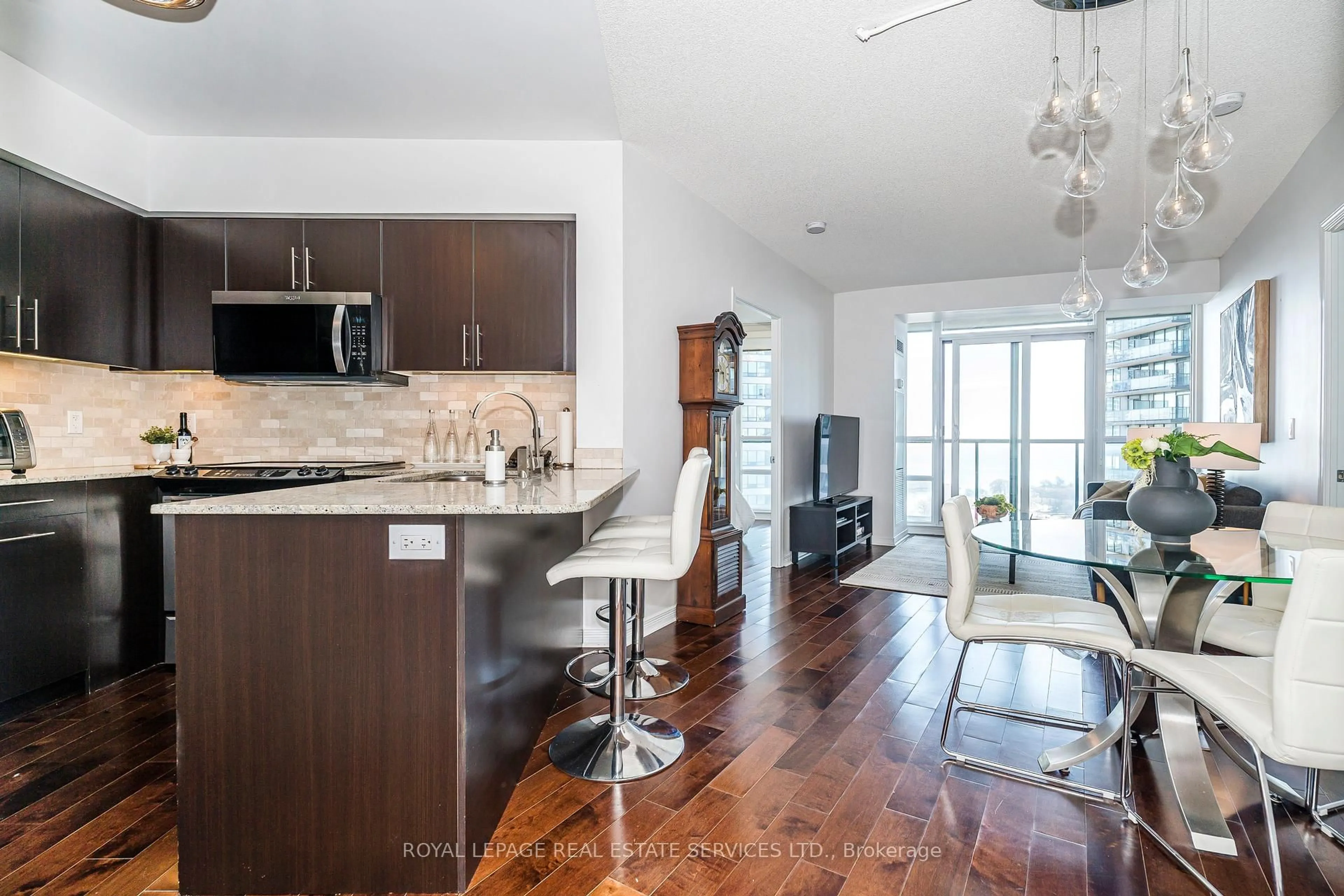 Open concept kitchen, wood/laminate floor for 15 Legion Rd #1807, Toronto Ontario M8V 0A9