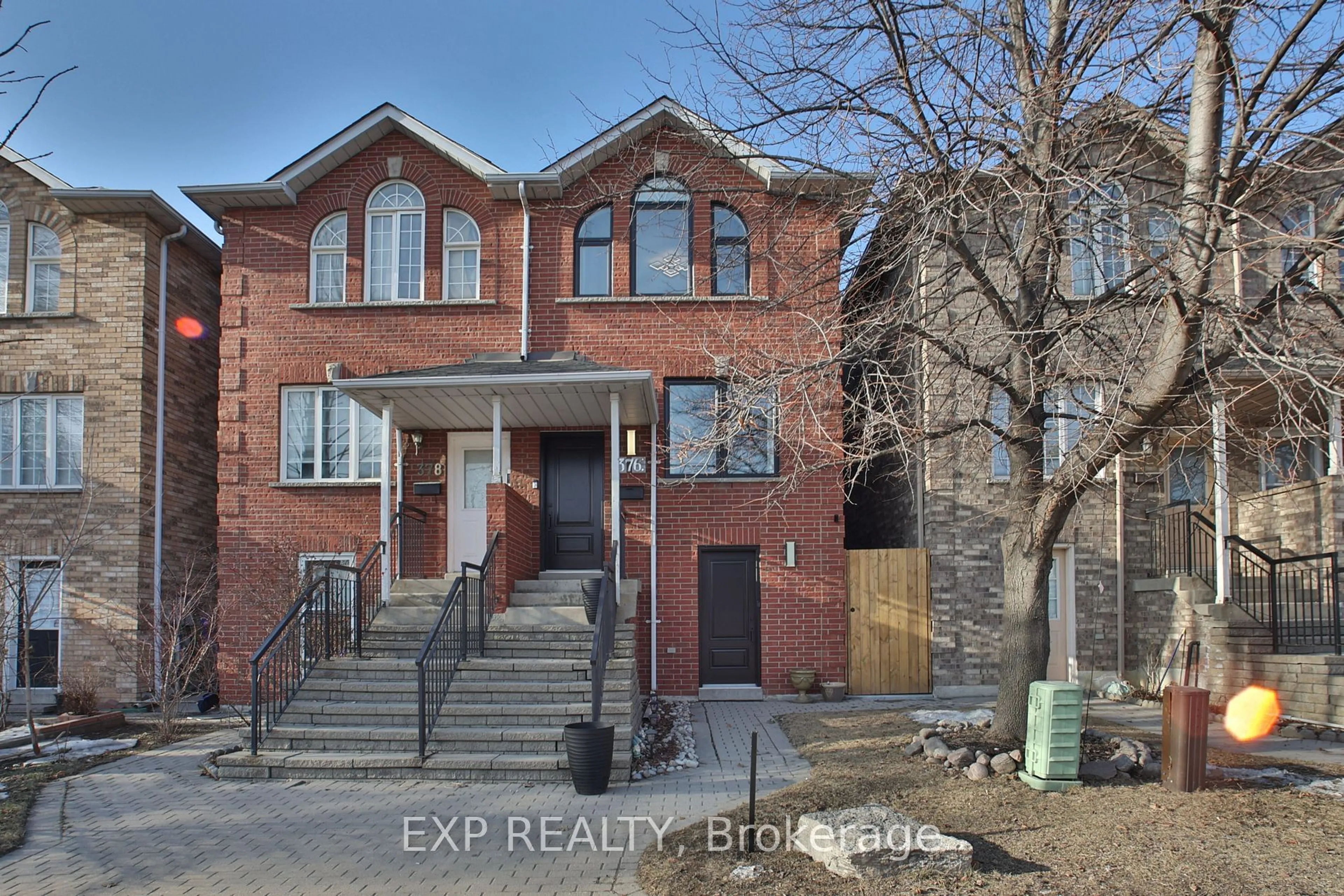 Home with brick exterior material, street for 376 Rogers Rd, Toronto Ontario M6E 5A7