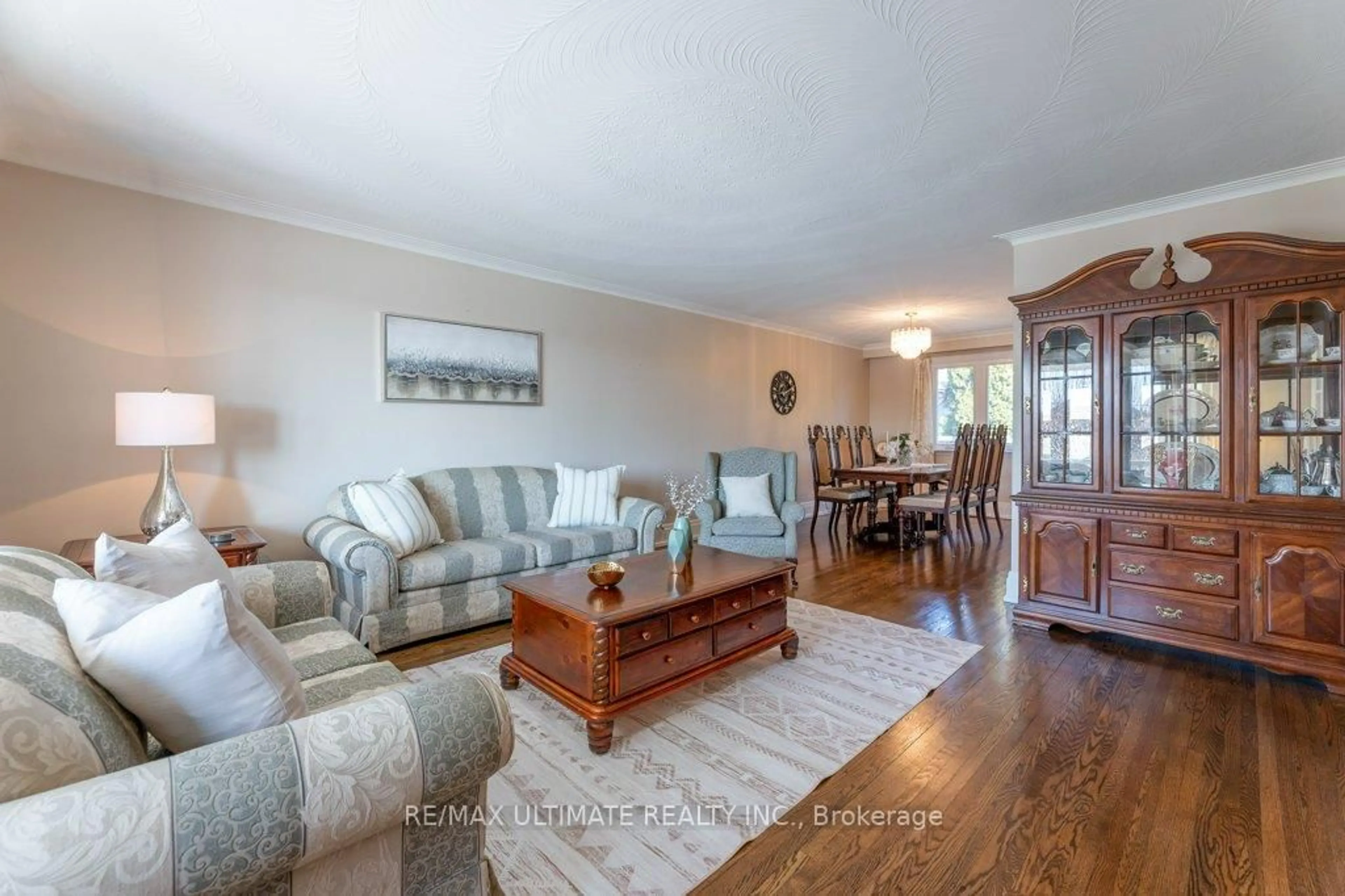 Living room with furniture, wood/laminate floor for 47 Jocada Rd, Toronto Ontario M6L 2J4