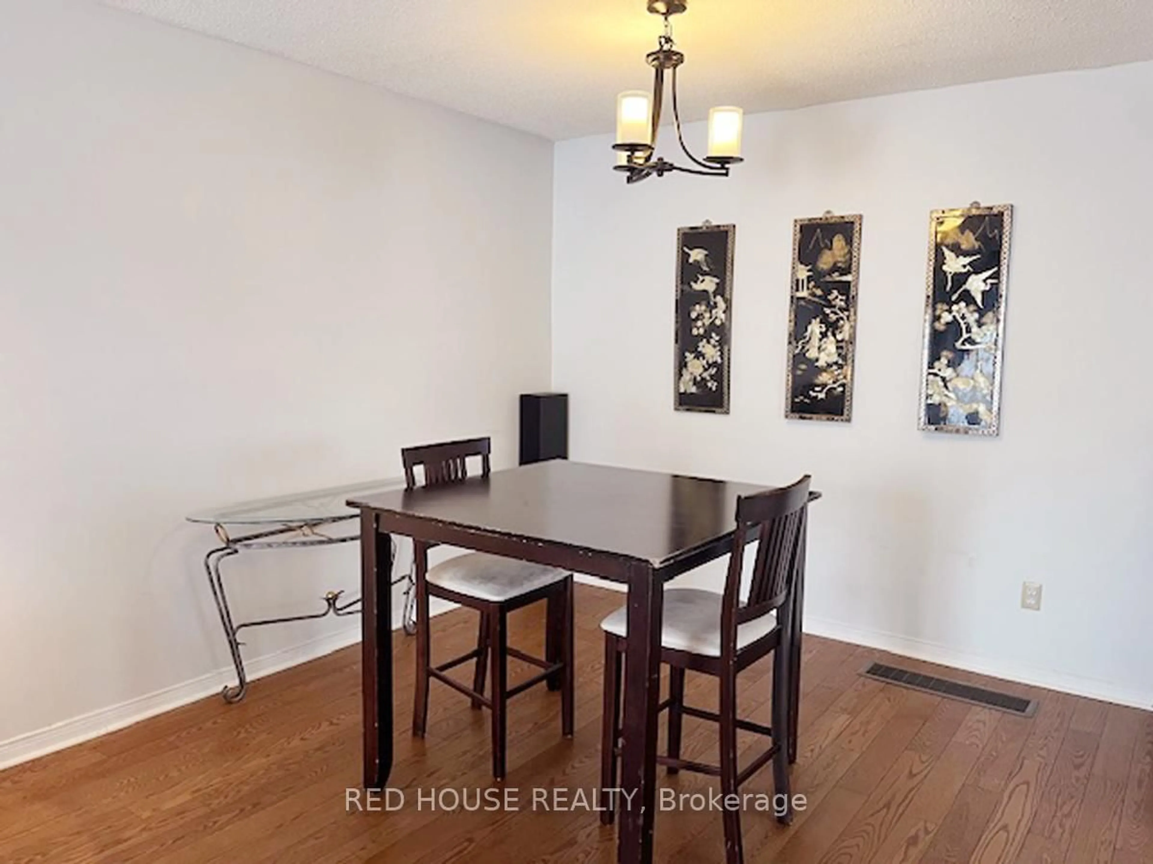 Dining room, wood/laminate floor for 36 Mount Pleasant Dr, Brampton Ontario L6Z 1K2